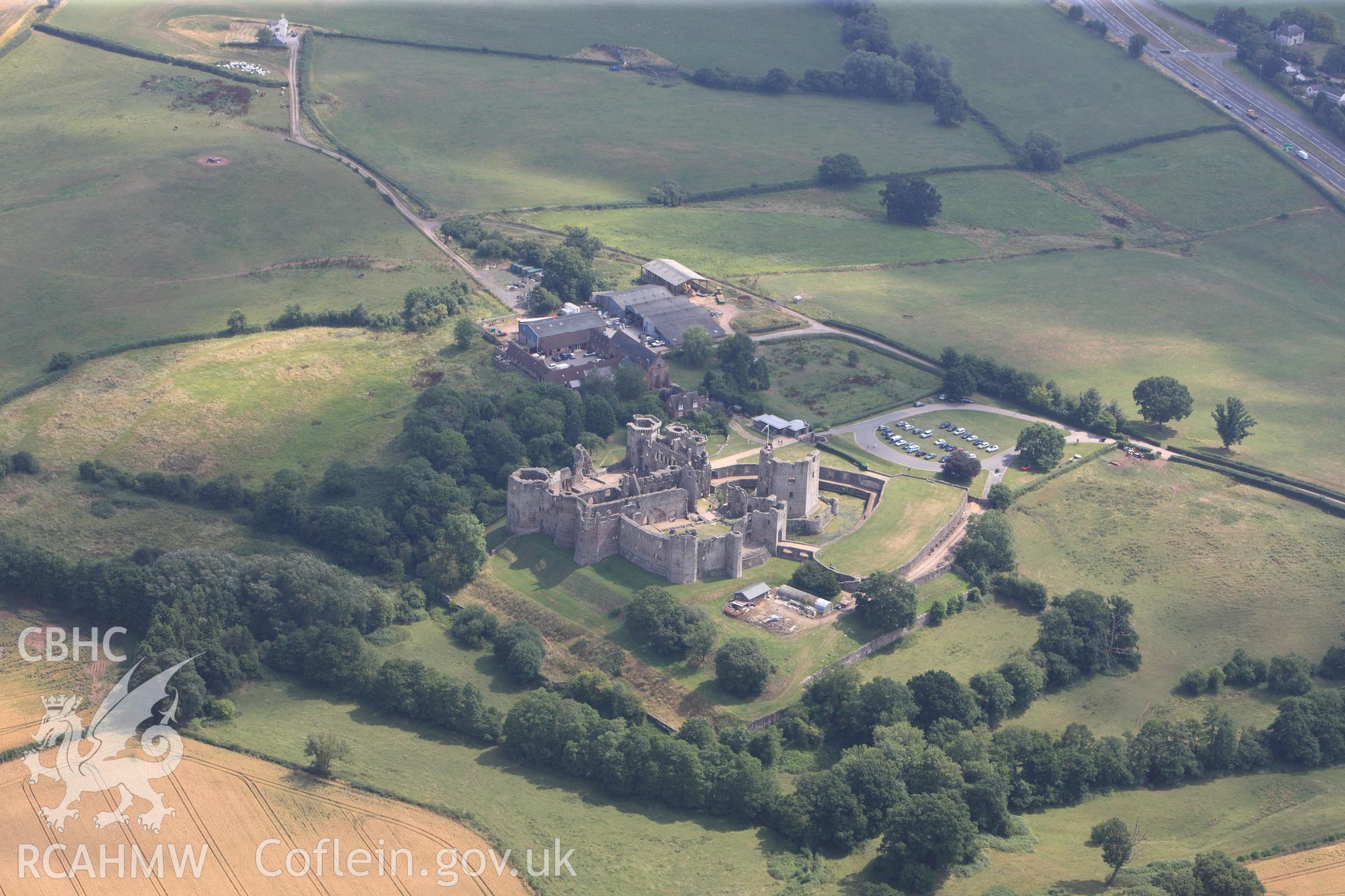 Raglan Castle, Raglan Castle Gardens and Castle Farm, Raglan, south west of Monmouth. Oblique aerial photograph taken during the Royal Commission?s programme of archaeological aerial reconnaissance by Toby Driver on 1st August 2013.