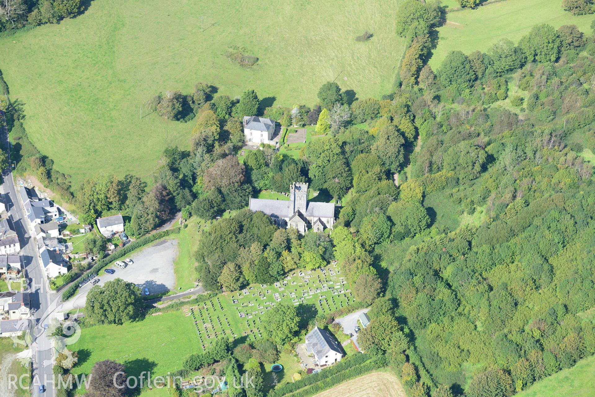 St. Martin's church and churchyard, Laugharne. Oblique aerial photograph taken during the Royal Commission's programme of archaeological aerial reconnaissance by Toby Driver on 30th September 2015.