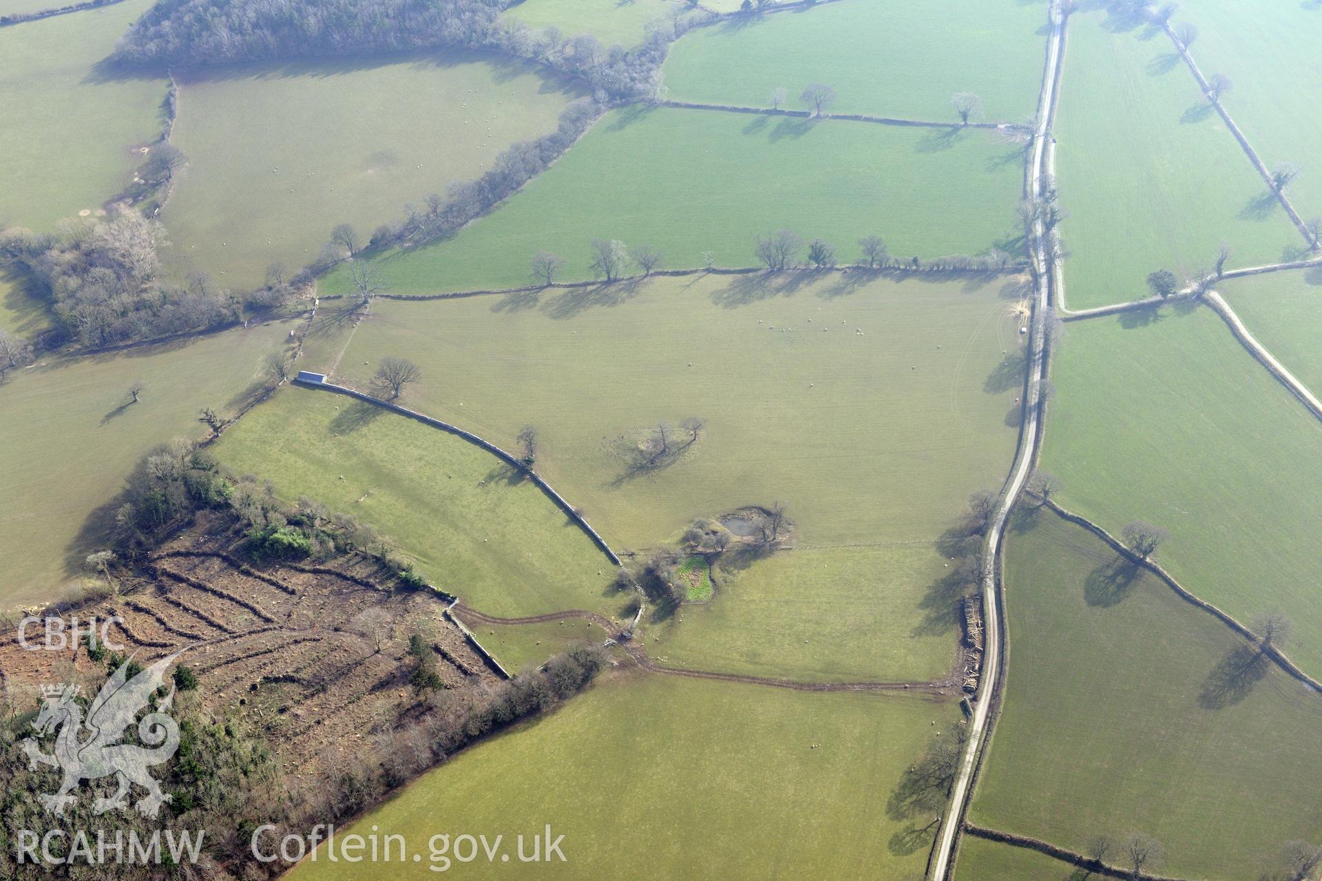 Plas Heaton barrow, Henllan, north west of Denbigh. Oblique aerial photograph taken during the Royal Commission?s programme of archaeological aerial reconnaissance by Toby Driver on 28th February 2013.