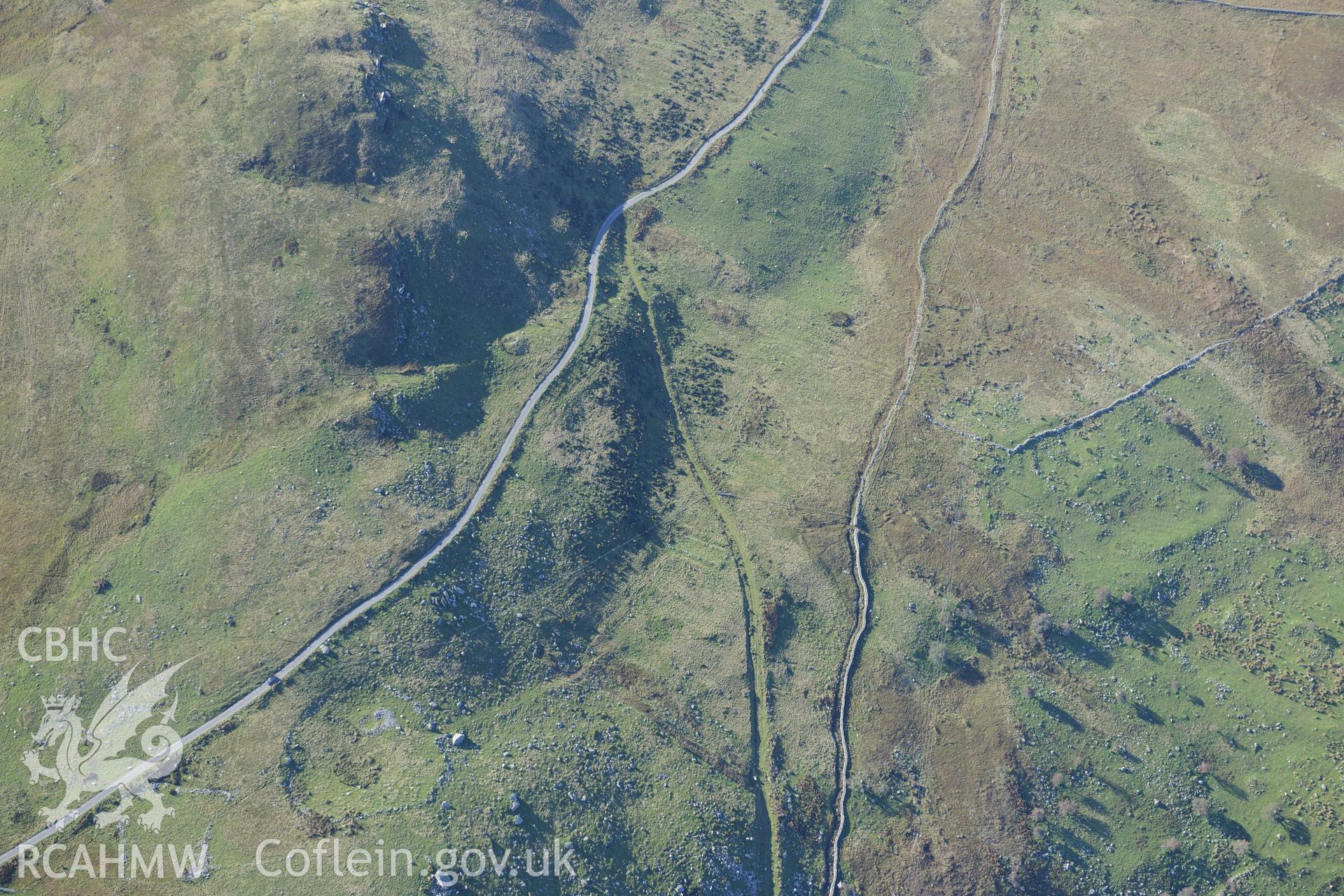 Bryn Seward settlement, south east of Fairbourne. Oblique aerial photograph taken during the Royal Commission's programme of archaeological aerial reconnaissance by Toby Driver on 2nd October 2015.