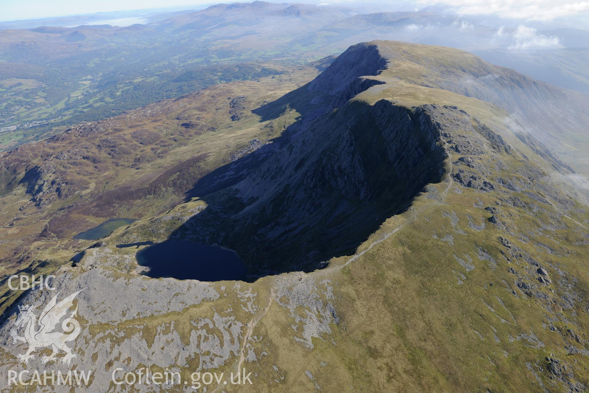 Penygadair - the summit of Cadair Idris. Oblique aerial photograph taken during the Royal Commission's programme of archaeological aerial reconnaissance by Toby Driver on 2nd October 2015.