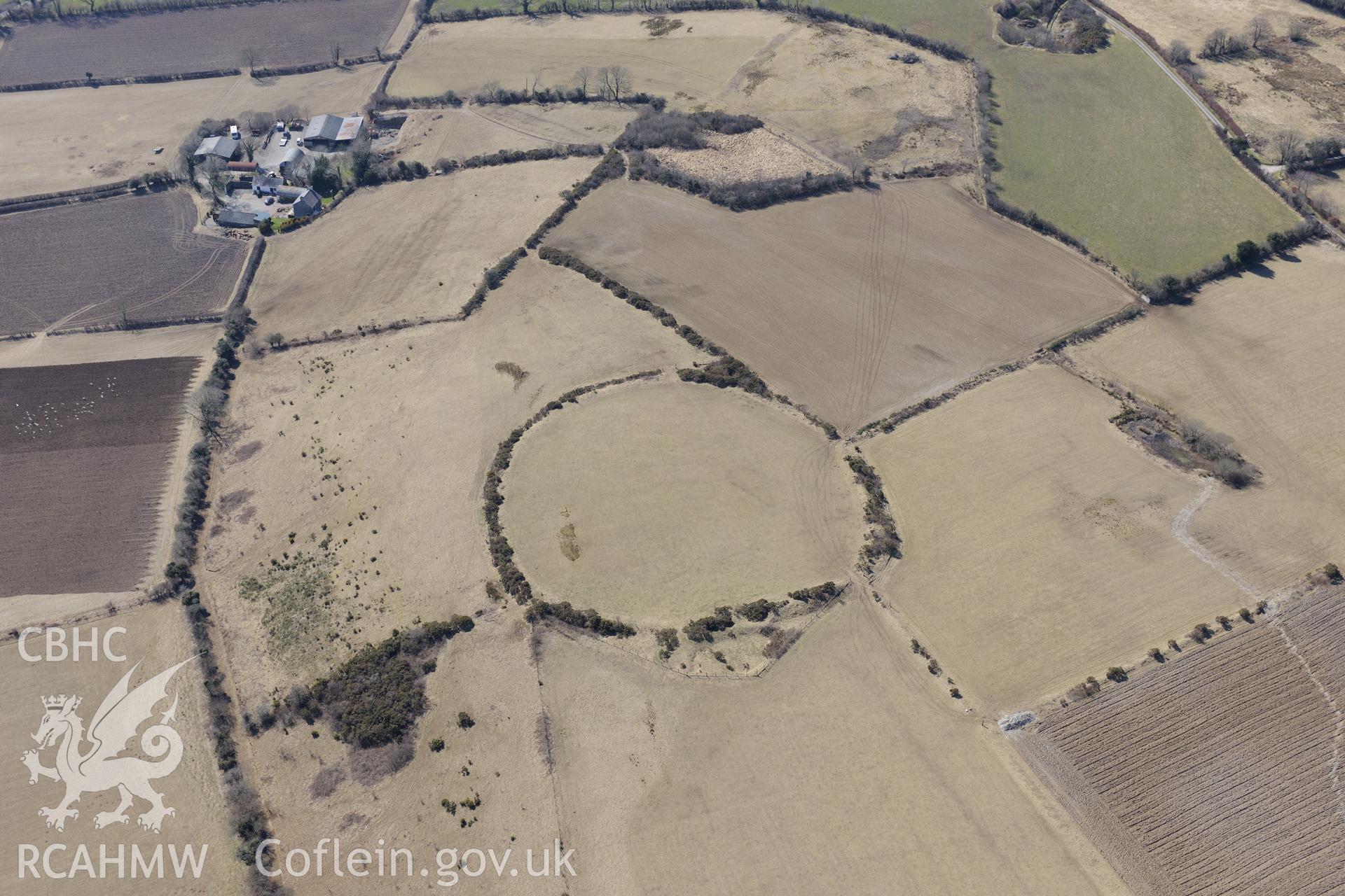 Cribbyn Clottas hillfort, Cribyn, north west of Lampeter. Oblique aerial photograph taken during the Royal Commission's programme of archaeological aerial reconnaissance by Toby Driver on 2nd April 2013.