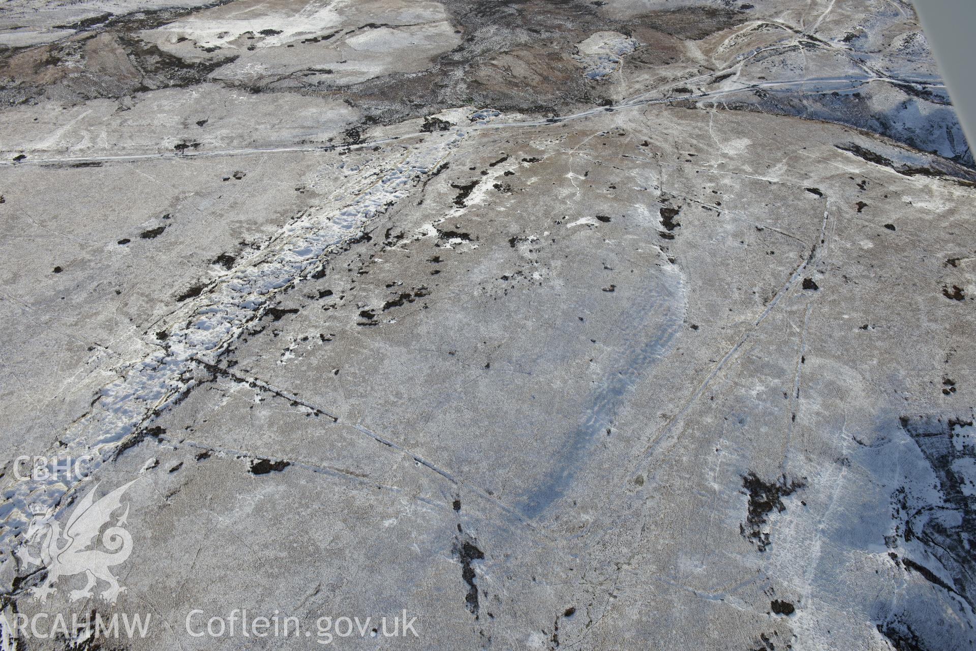 Y Pigwn Roman camps, Mynydd Bach, Trecastell. Oblique aerial photograph taken during the Royal Commission?s programme of archaeological aerial reconnaissance by Toby Driver on 15th January 2013.