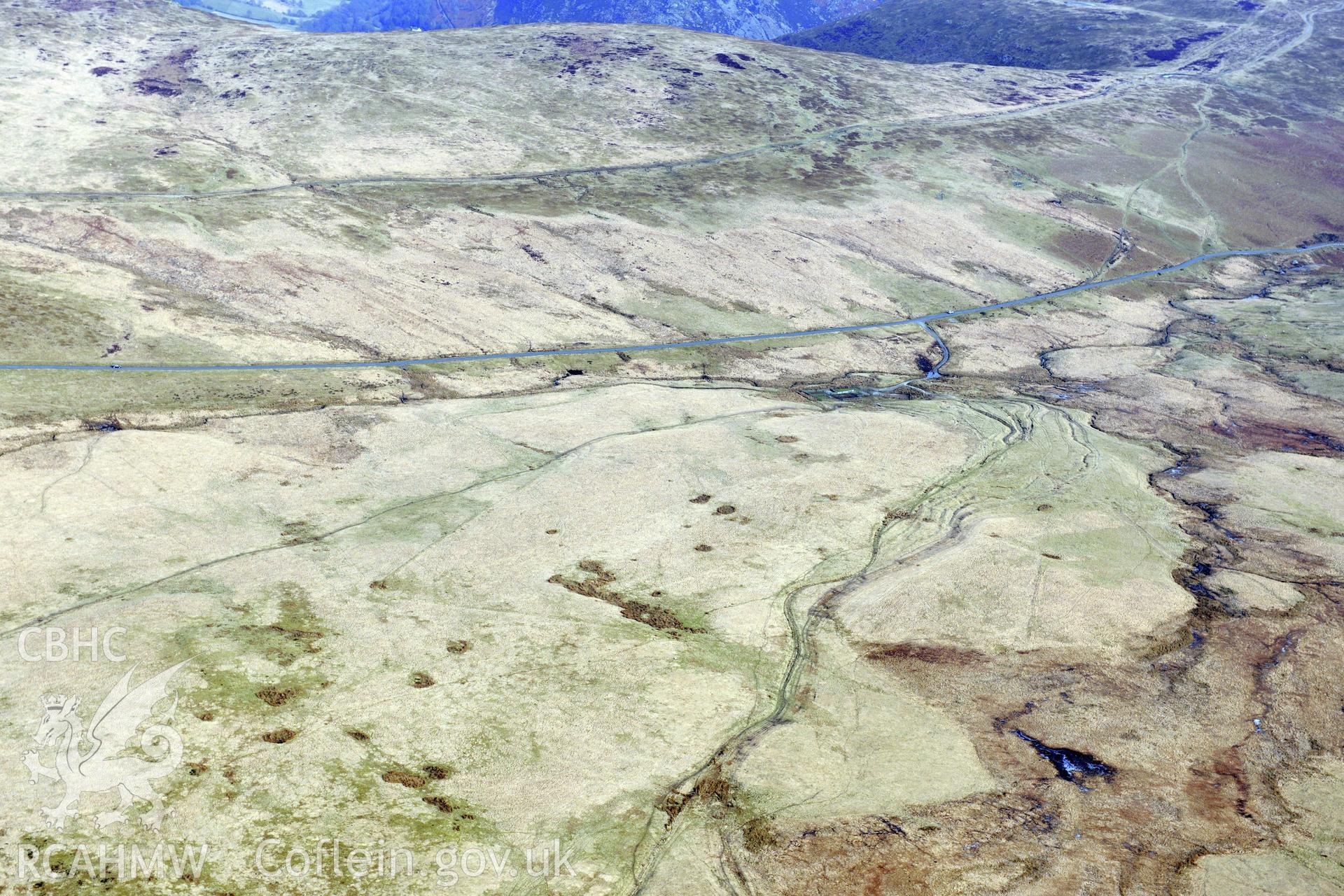 Esgair Perfedd marching camp and trackway, north west of Rhayader. Oblique aerial photograph taken during the Royal Commission?s programme of archaeological aerial reconnaissance by Toby Driver on 28th February 2013.