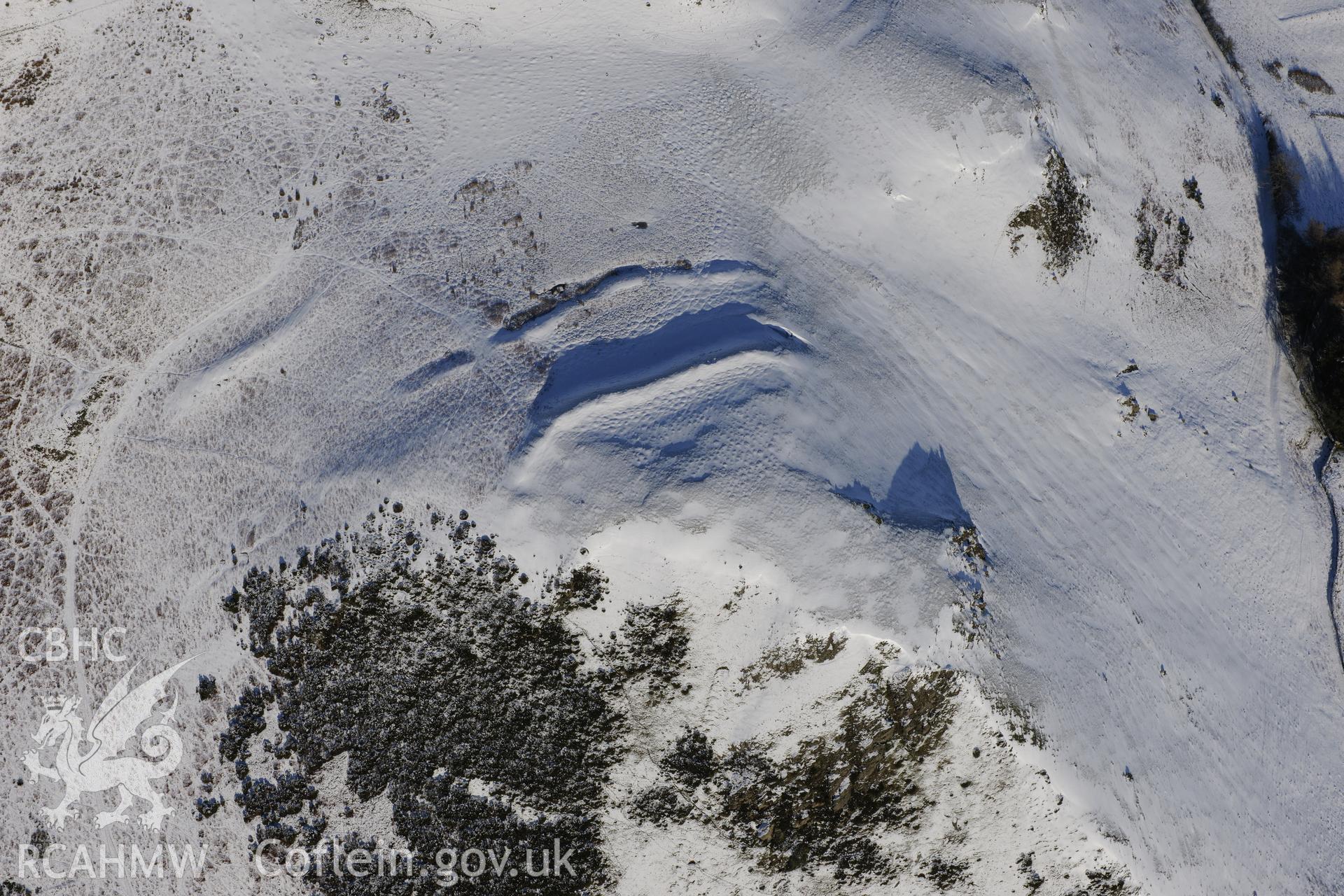 Cwm Berwyn defended enclosure, north east of Builth Wells. Oblique aerial photograph taken during the Royal Commission?s programme of archaeological aerial reconnaissance by Toby Driver on 15th January 2013.