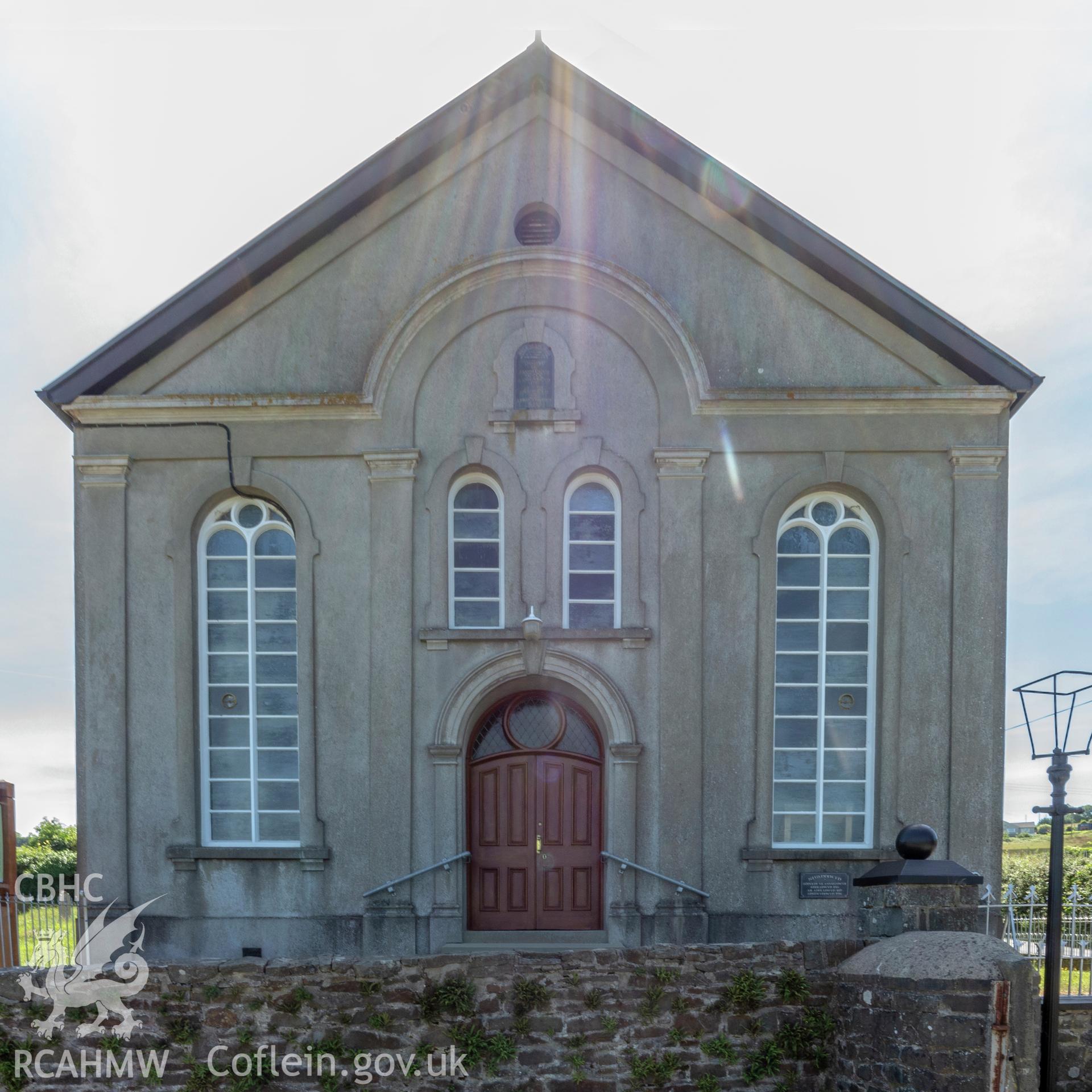 Colour photograph showing front elevation and entrance of Neuadd-Lwyd Welsh Independent Chapel, near Aberaeron. Photographed by Richard Barrett on 24th June 2018.