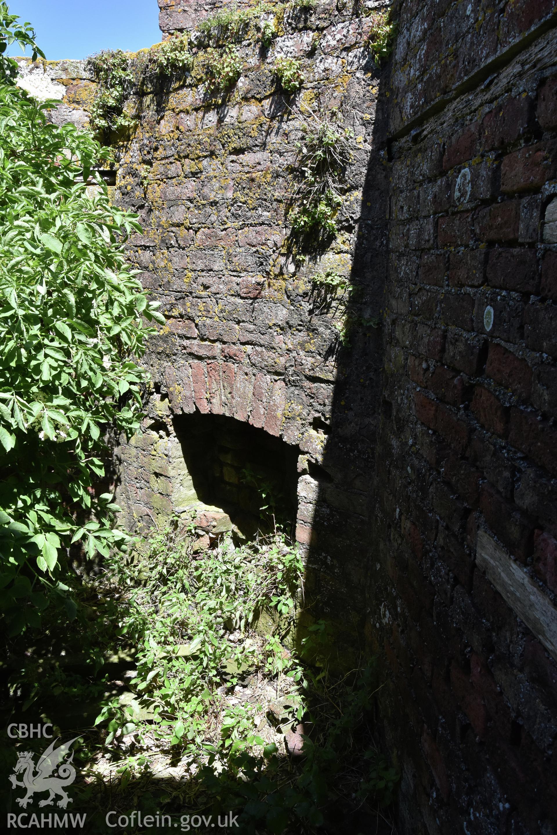 Investigator's photographic survey of the Telegraph Station on Puffin Island or Ynys Seiriol for the CHERISH Project. Interior view of ruin. ? Crown: CHERISH PROJECT 2018. Produced with EU funds through the Ireland Wales Co-operation Programme 2014-2020. All material made freely available through the Open Government Licence.