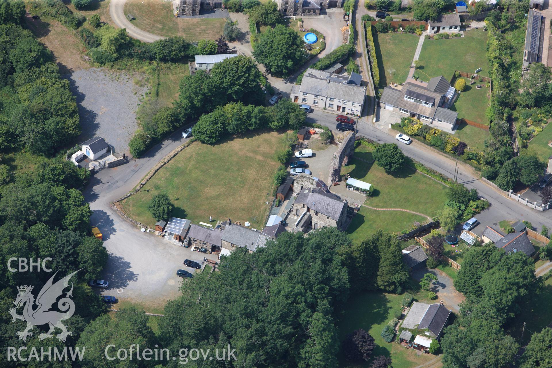 Priory of St Budoc and the Blessed Virgin, and Priory Farm, Milford Haven. Oblique aerial photograph taken during the Royal Commission?s programme of archaeological aerial reconnaissance by Toby Driver on 16th July 2013.