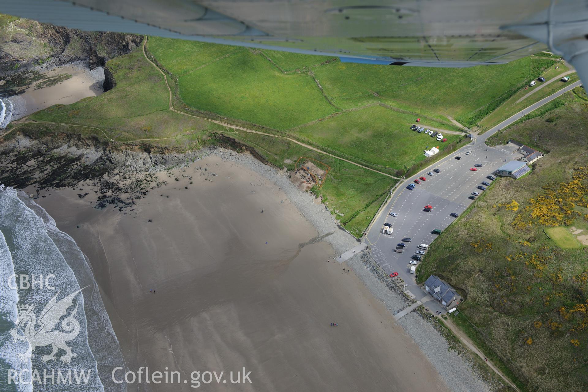 Excavation of St. Patricks Chapel by Dyfed Archaeological Trust, Whitesands Bay or Porth Mawr, near St. Davids. Oblique aerial photograph taken during the Royal Commission's programme of archaeological aerial reconnaissance by Toby Driver on 13th May 2015.