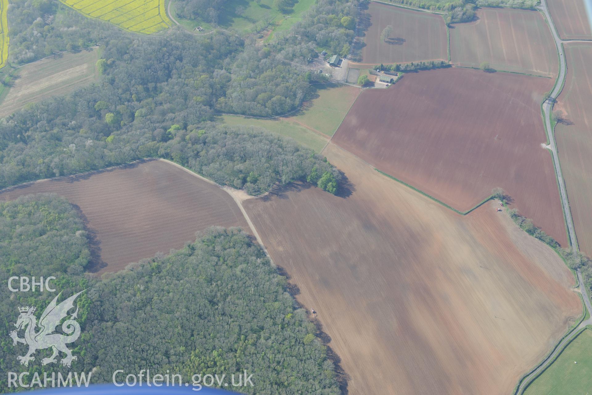 Soilmark enclosures near Nutstalks Wood. Oblique aerial photograph taken during the Royal Commission's programme of archaeological aerial reconnaissance by Toby Driver on 21st April 2015.