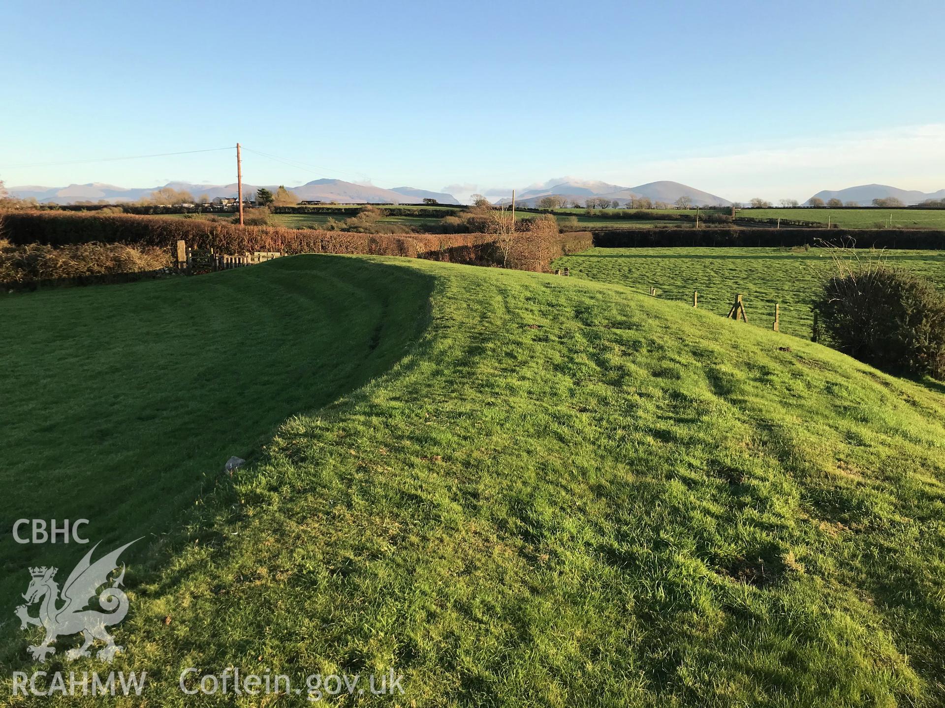 Digital colour photograph showing Castell Bryn Gwyn neolithic henge and later ringwork, Llanidan, taken by Paul Davis on 3rd December 2019.