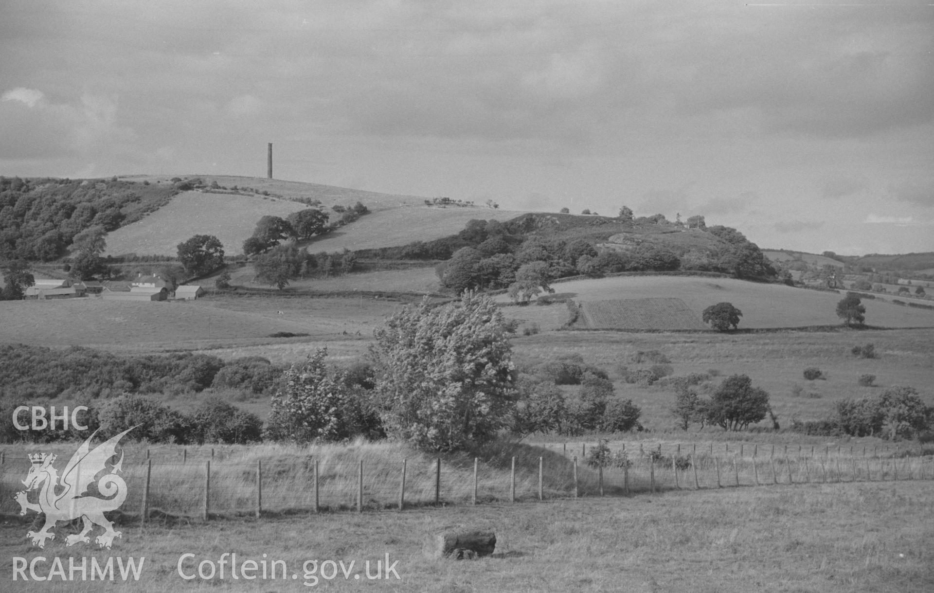 Digital copy of black & white negative showing view of Coed-Parc Farm, Derry Ormond Tower, Bettws Bledrws & Llangybi. Lampeter-Aberystwyth railway in foreground. Photograph by Arthur O. Chater, 4 September 1966, looking north east from Grid Ref SN 590 506.