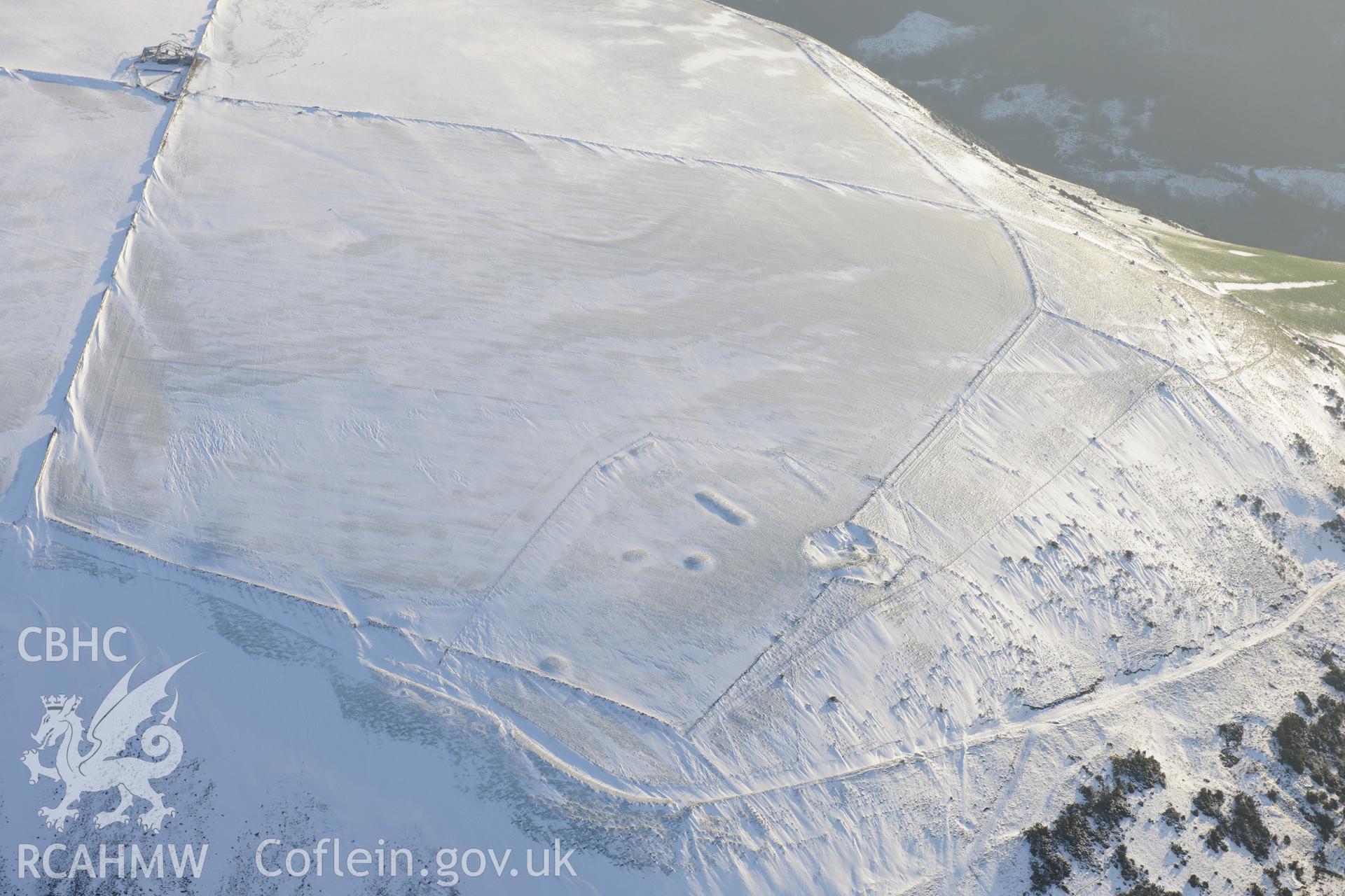 Mynydd-y-Brombil rabbit warren, on the south western edge of Margam forest. Oblique aerial photograph taken during the Royal Commission?s programme of archaeological aerial reconnaissance by Toby Driver on 24th January 2013.