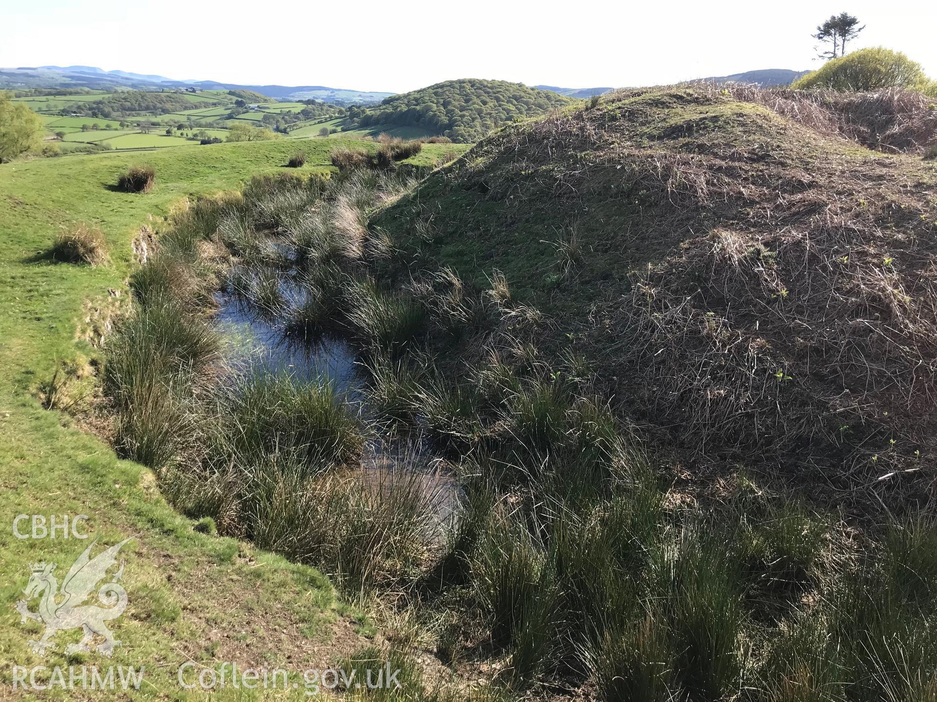 Colour photo of Twdin (also known as Caer Aeron and Fforest Castle) and its surroundings, Treflys, taken by Paul R. Davis, 14th May 2018.