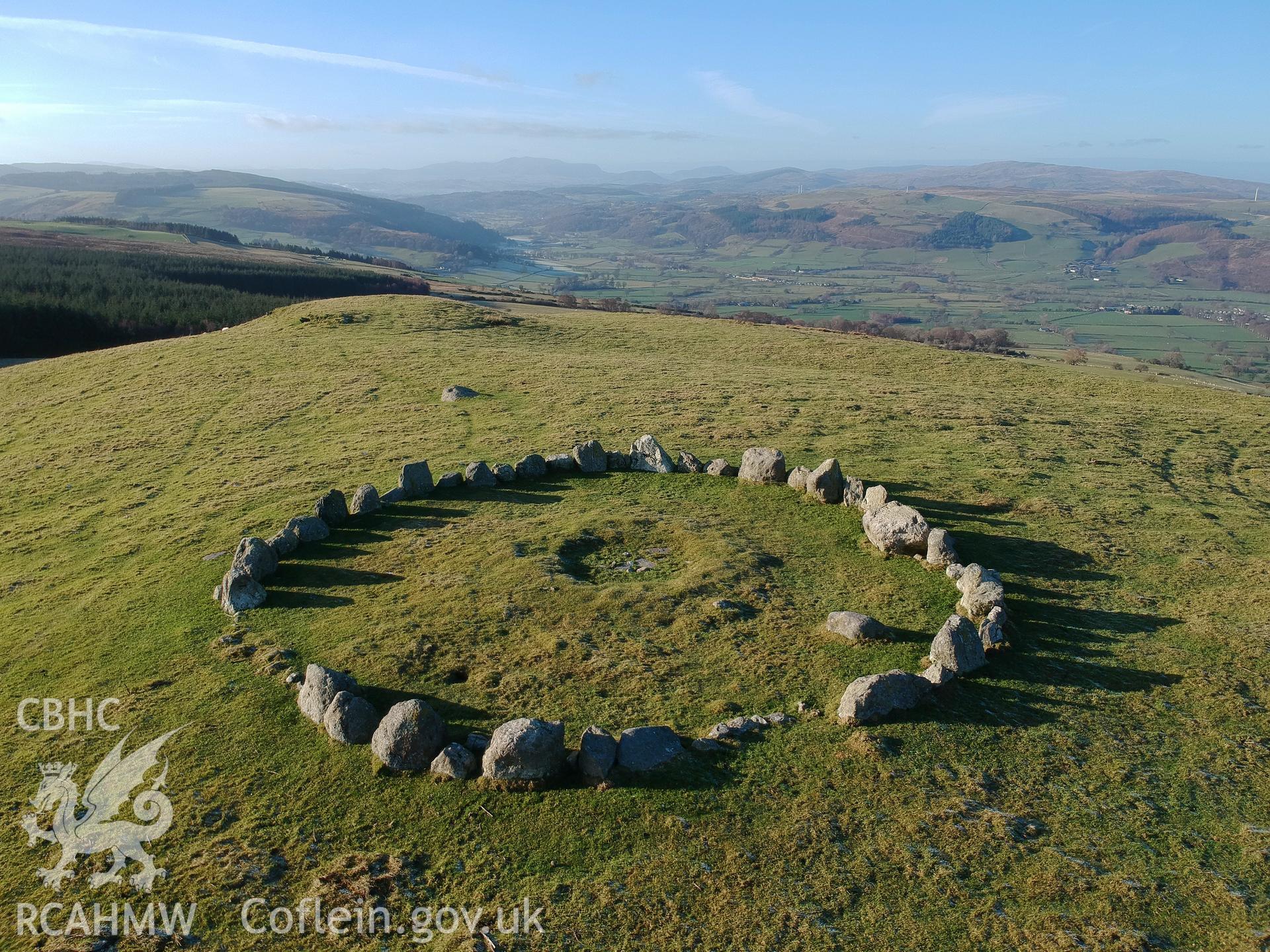 Aerial view from the west of Moel Ty-Uchaf kerb circle, Llandrillo. Colour photograph taken by Paul R. Davis on 2nd January 2019.