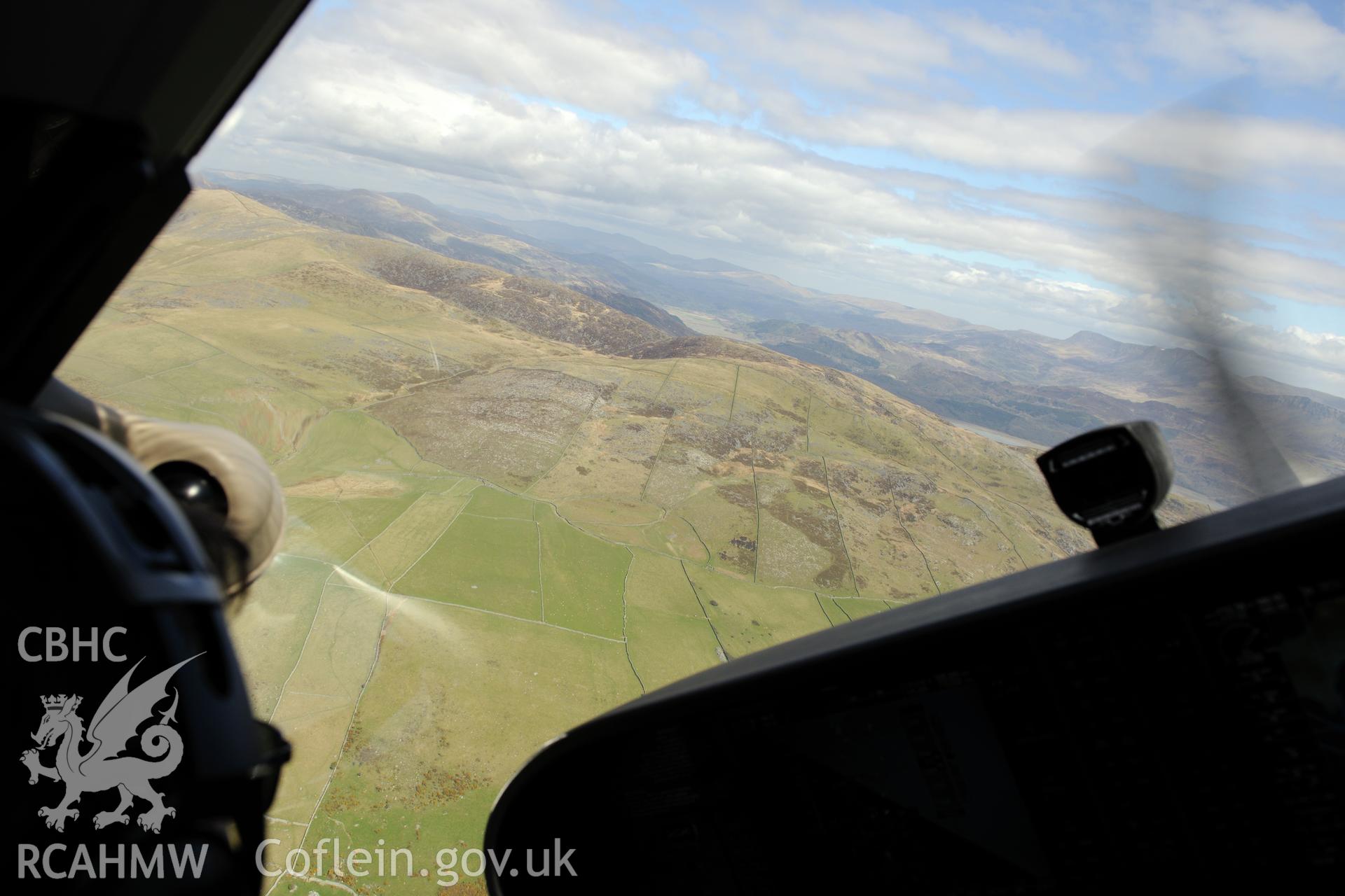 View from the west of the deserted settlements south of Ffridd Olchfa and west of Hafoty mines, Dyffryn Ardudwy. Oblique aerial photograph taken during the Royal Commission?s programme of archaeological aerial reconnaissance by Toby Driver on 1st May 2013.