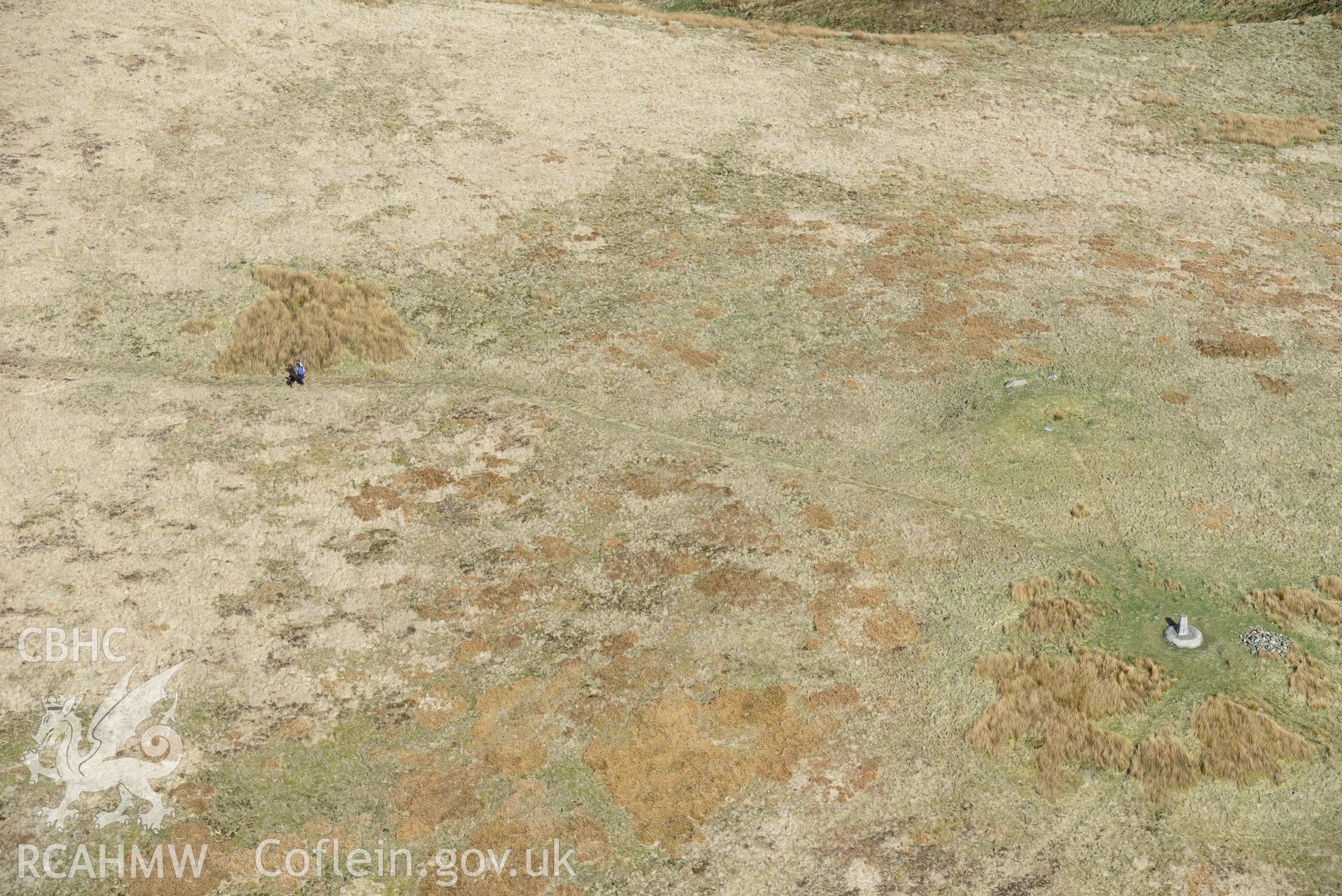 Foel Cwm-Cerwyn II - IV, Cairns. Oblique aerial photograph taken during the Royal Commission's programme of archaeological aerial reconnaissance by Toby Driver on 15th April 2015.'