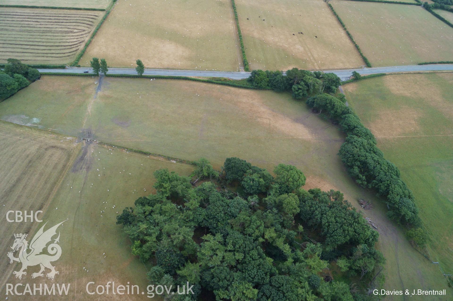 Aerial photograph of Square Barrow Cemetery, Croes Faen, taken by Glyn Davies & Jonathan Brentnall 15/07/2018 under drought conditions. This photograph is the original, for modified version which enhances visibility of the archaeology, see: BDC_04_01_01.