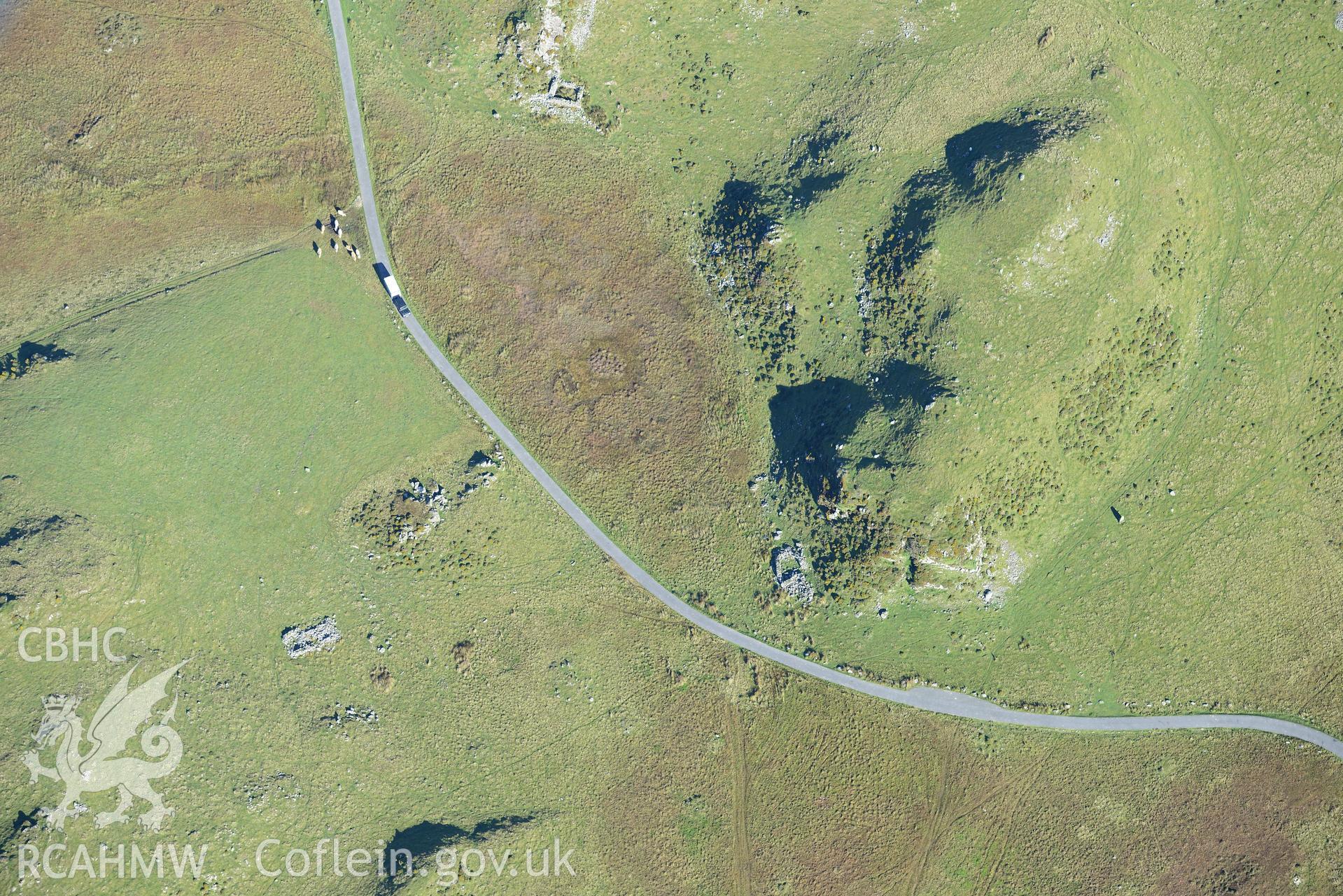 Standing stone at Carreg-y-Big, near Llynnau Cregennen, on the north western edge of Cadair Idris. Oblique aerial photograph taken during the Royal Commission's programme of archaeological aerial reconnaissance by Toby Driver on 2nd October 2015.