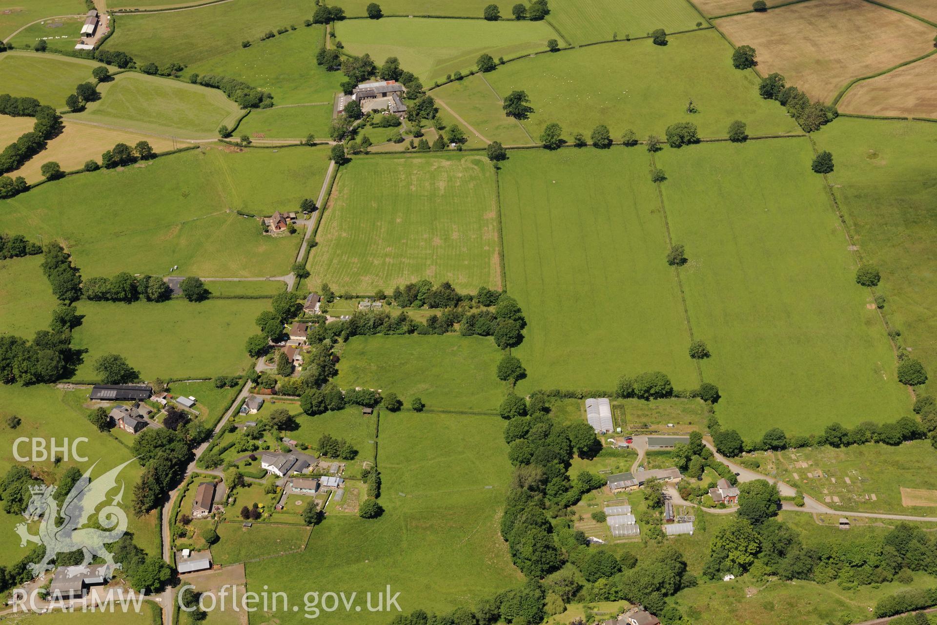 Llandrindod Common road camp XVI and XVII, south west of Llandrindod Wells on the A483. Oblique aerial photograph taken during the Royal Commission's programme of archaeological aerial reconnaissance by Toby Driver on 30th June 2015.