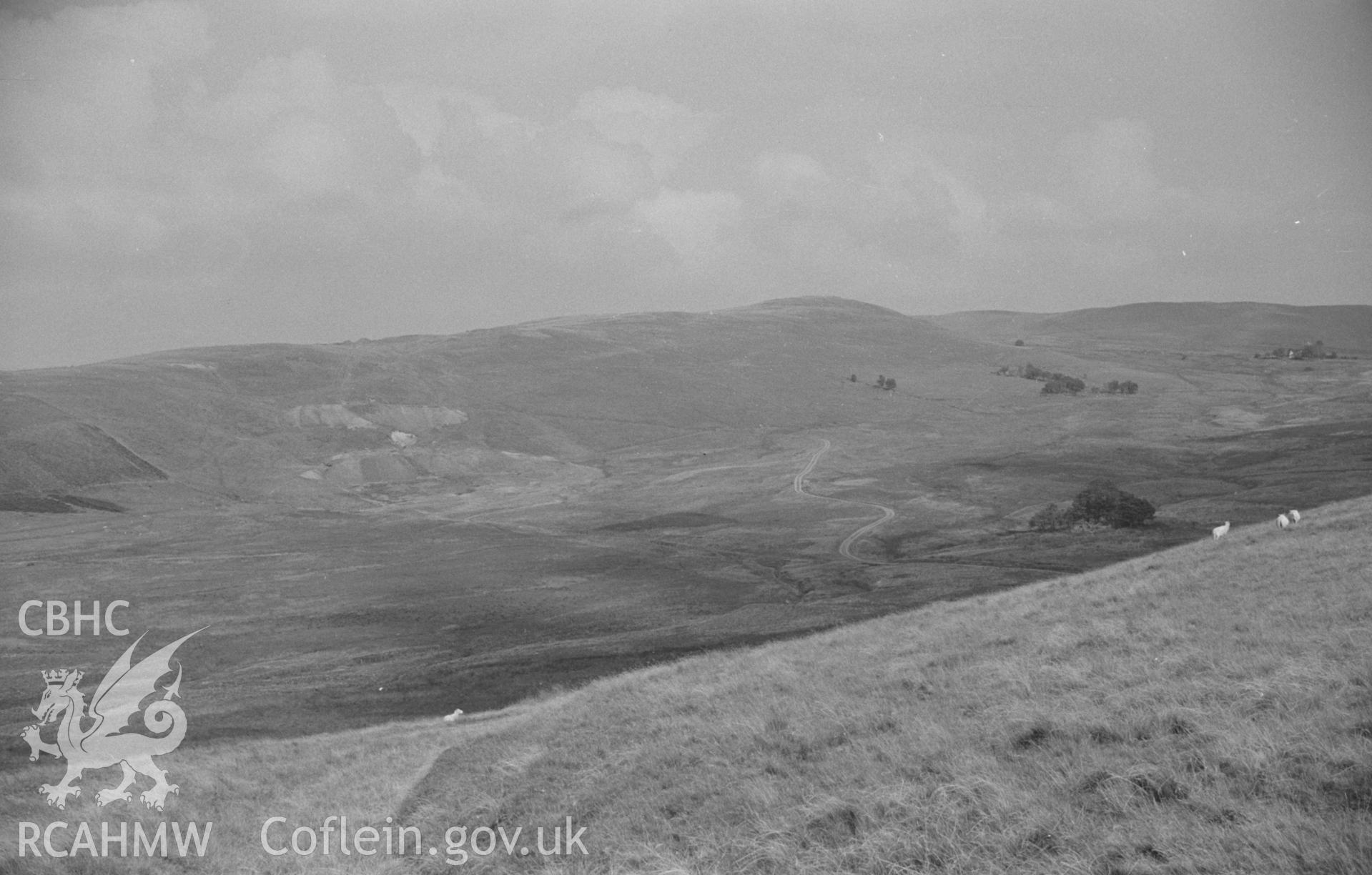 Digital copy of a black and white negative showing Esgair Mwyn Mine from the road from Ffair-Rhos, Ystrad Fflur. Photographed by Arthur O. Chater on 28th August 1966 looking north east from Grid Reference SN 747 685.