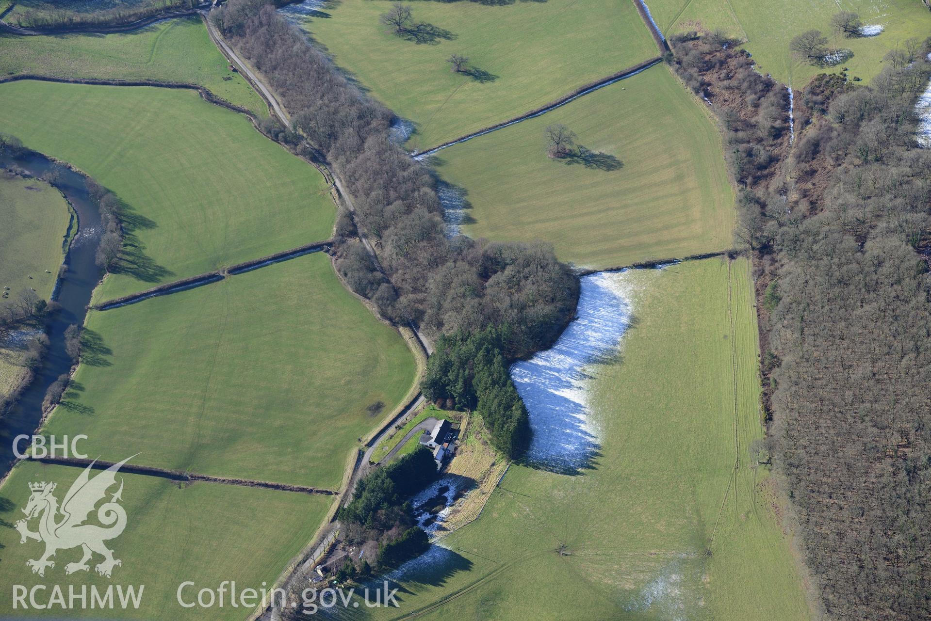Castell Gwynionydd defended enclosure, north east of Llandysul. Oblique aerial photograph taken during the Royal Commission's programme of archaeological aerial reconnaissance by Toby Driver on 4th February 2015.