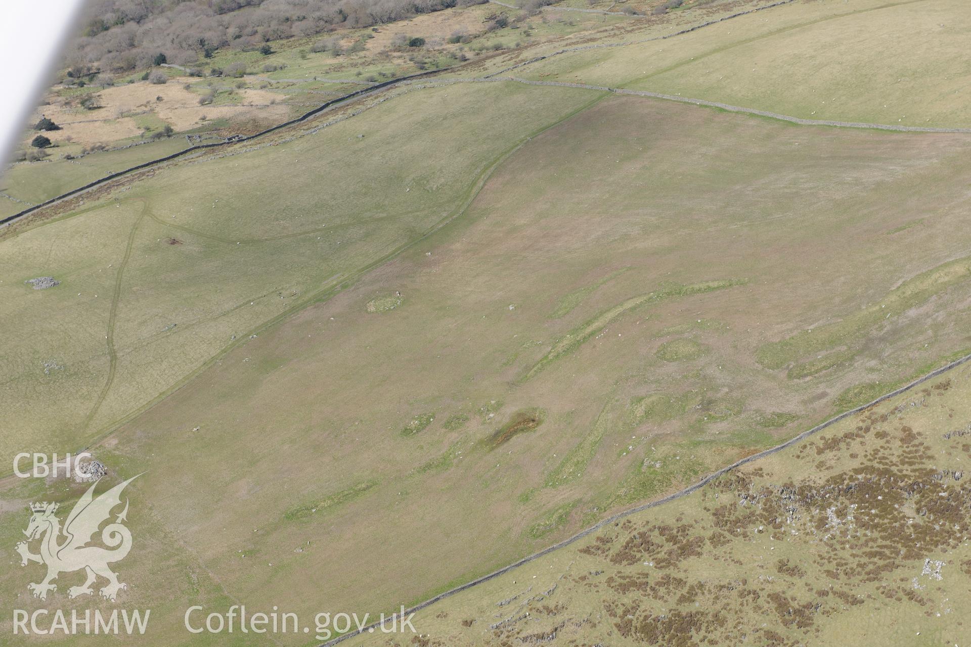 Cairn circles at Moel Goedog, Harlech. Oblique aerial photograph taken during the Royal Commission?s programme of archaeological aerial reconnaissance by Toby Driver on 1st May 2013.