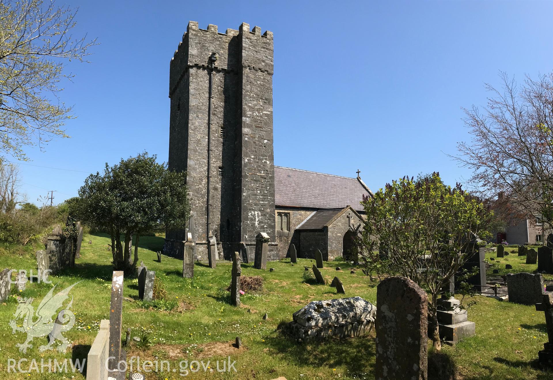 Colour photo showing exterior view of St. Lawrence's church and graveyard, Marros, taken by Paul R. Davis, 6th May 2018.