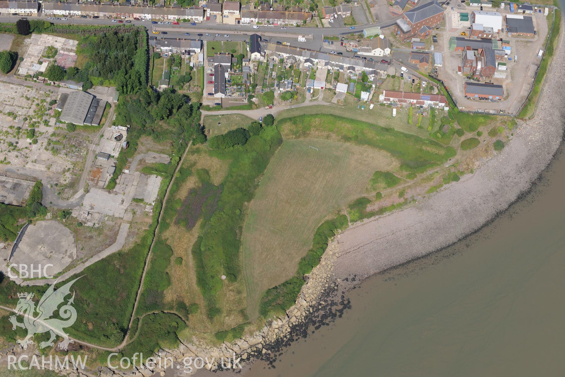 Sudbrook village, east of Caldicot, with Sudbrook fort, pumping station & the remains of Sudbrook medieval village. Oblique aerial photograph taken during Royal Commission?s programme of archaeological aerial reconnaissance by Toby Driver, 1st August 2013.