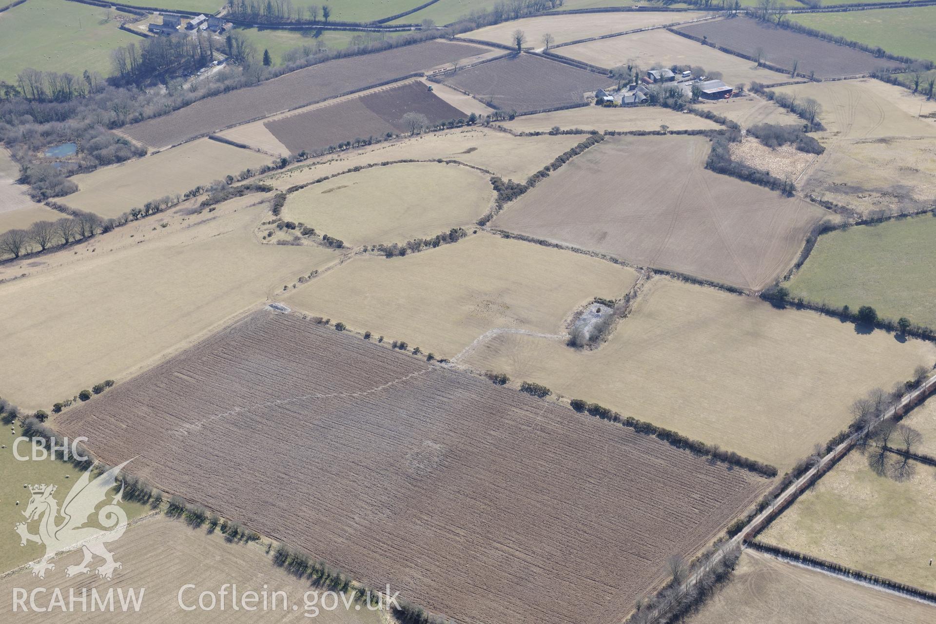 Cribbyn Clottas hillfort, Cribyn, north west of Lampeter. Oblique aerial photograph taken during the Royal Commission's programme of archaeological aerial reconnaissance by Toby Driver on 2nd April 2013.