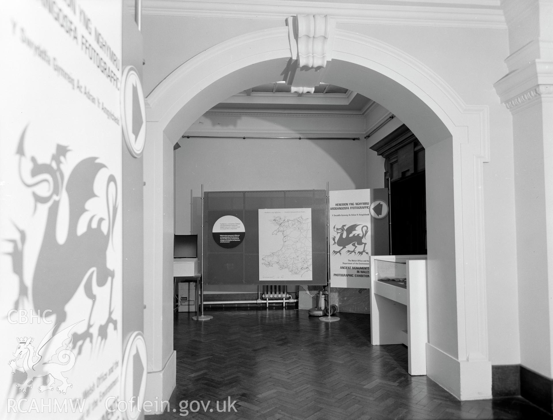 Digital copy of a black and white negative showing Ancient Monuments Exhibition, Welsh Tourer, Vivian Art Gallery, Swansea. From Cadw Monuments in Care Collection.