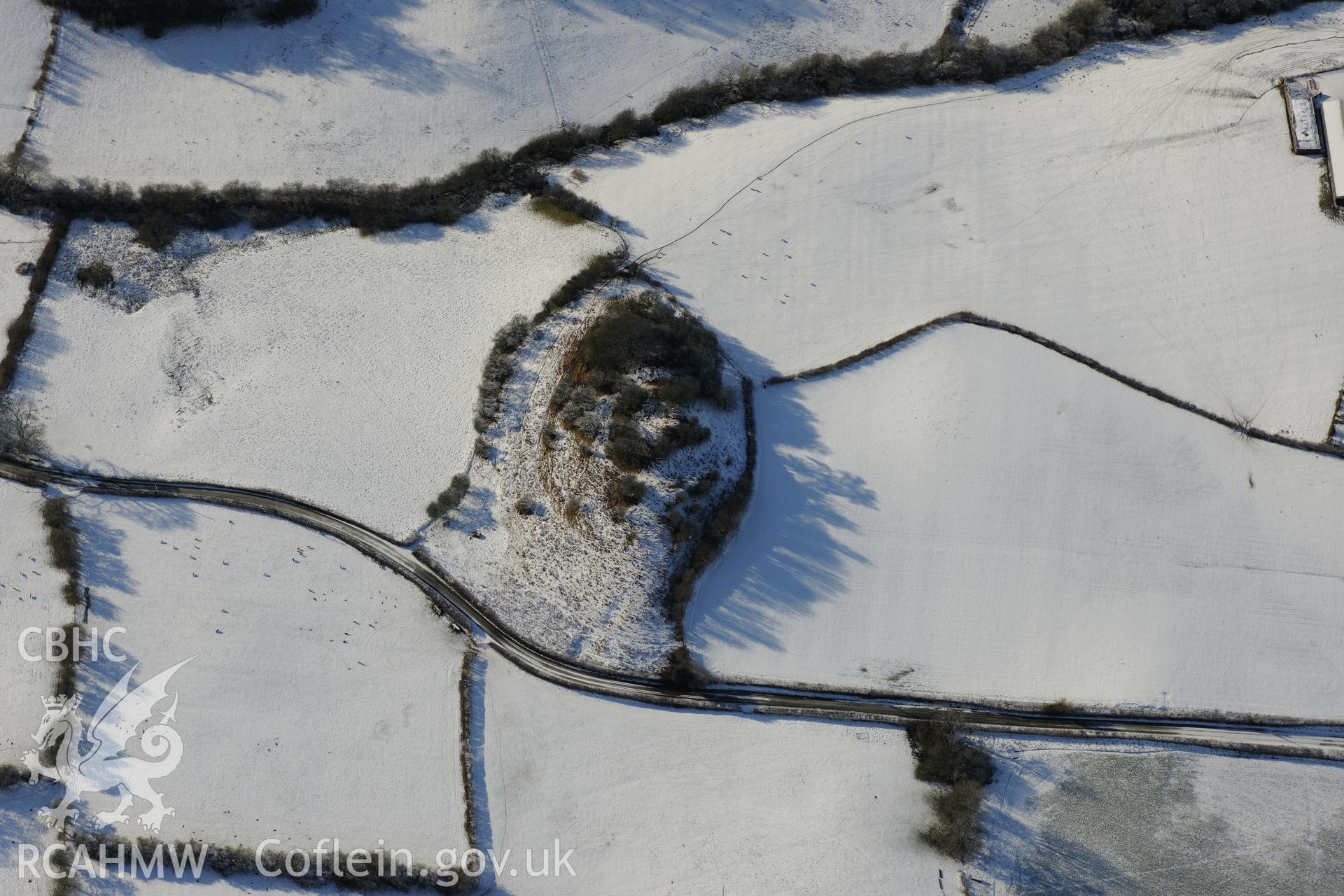 Penarth or Cenarth Mount, north east of Builth Wells. Oblique aerial photograph taken during the Royal Commission?s programme of archaeological aerial reconnaissance by Toby Driver on 15th January 2013.