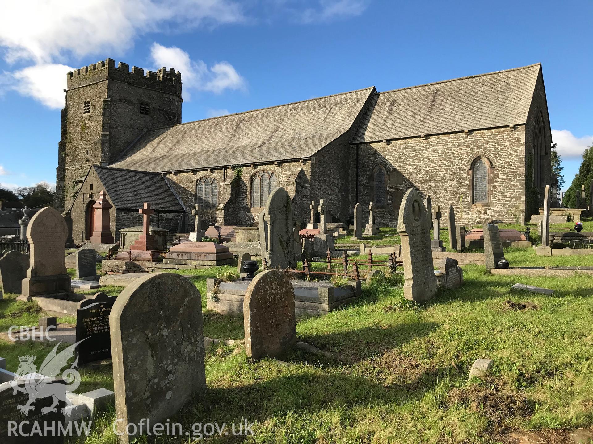 Exterior view of the Church of Saints Illtyd, Gwyno and Tydfodwg and associated graveyard in Llantrisant, north west of Cardiff. Colour photograph taken by Paul R. Davis on 14th October 2018.