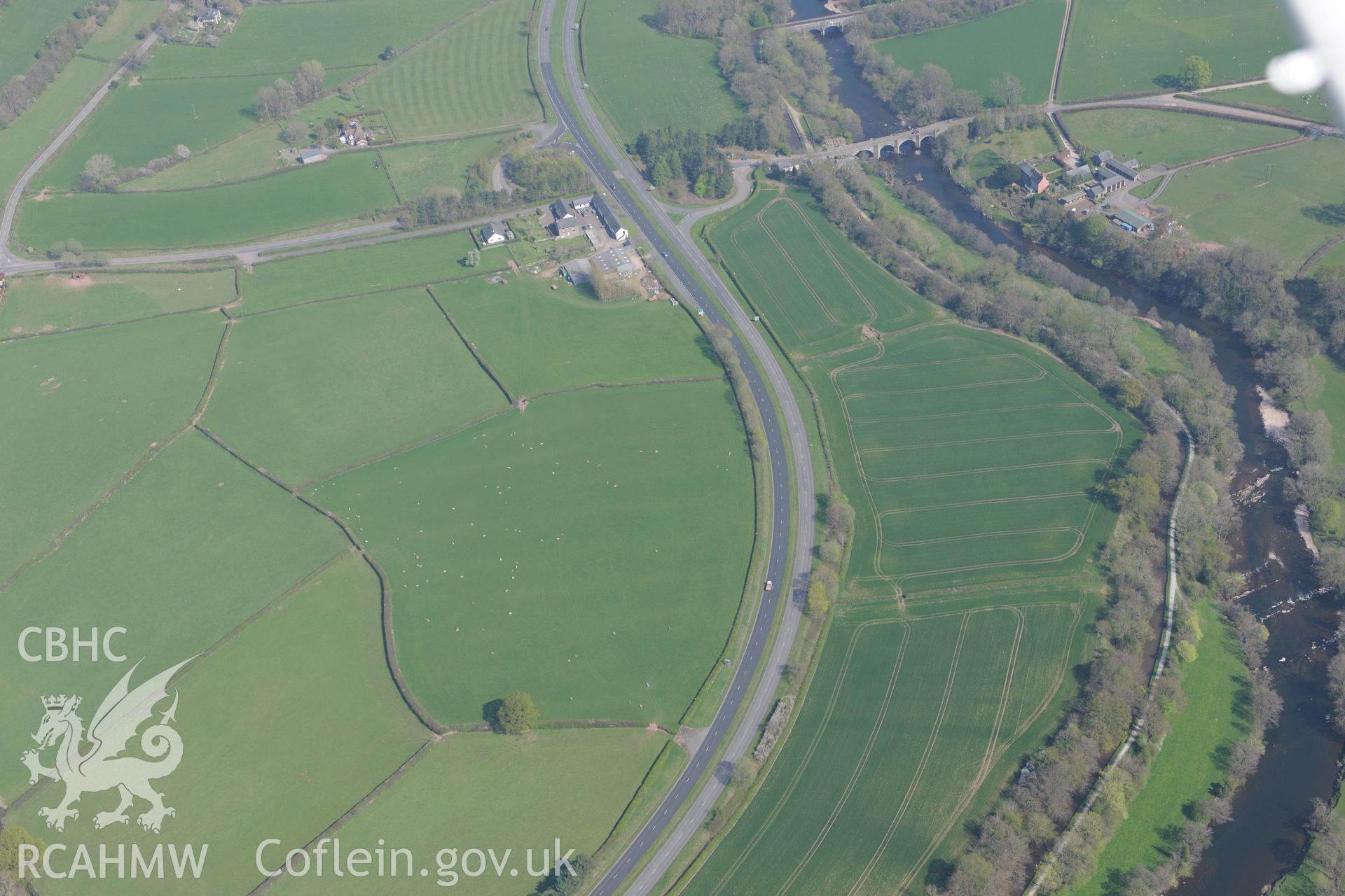 Cefn Brynich Farm, Cefn-Brynich Roman Fort, Lock Road Bridge and Aqueduct. Oblique aerial photograph taken during the Royal Commission's programme of archaeological aerial reconnaissance by Toby Driver on 21st April 2015