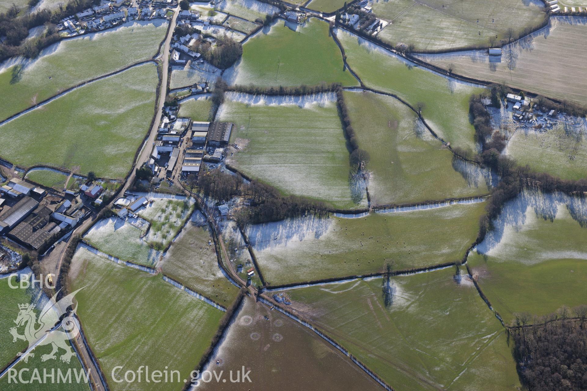 Pendre-Uchaf farm on the outskirts of Llangorse, east of Brecon. Oblique aerial photograph taken during the Royal Commission?s programme of archaeological aerial reconnaissance by Toby Driver on 15th January 2013.