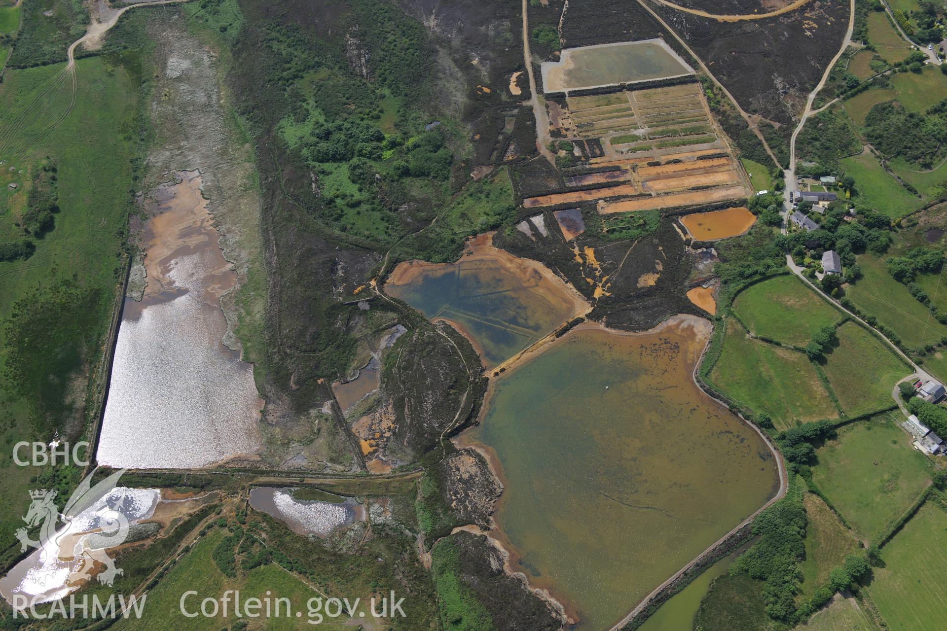 Parys Mountain copper mines, Amlwch, Anglesey. Oblique aerial photograph taken during the Royal Commission?s programme of archaeological aerial reconnaissance by Toby Driver on 12th July 2013.