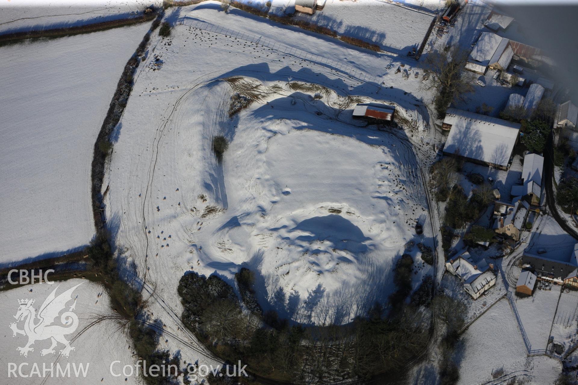 Motte and bailey castle at Painscastle, south east of Builth Wells. Oblique aerial photograph taken during the Royal Commission?s programme of archaeological aerial reconnaissance by Toby Driver on 15th January 2013.