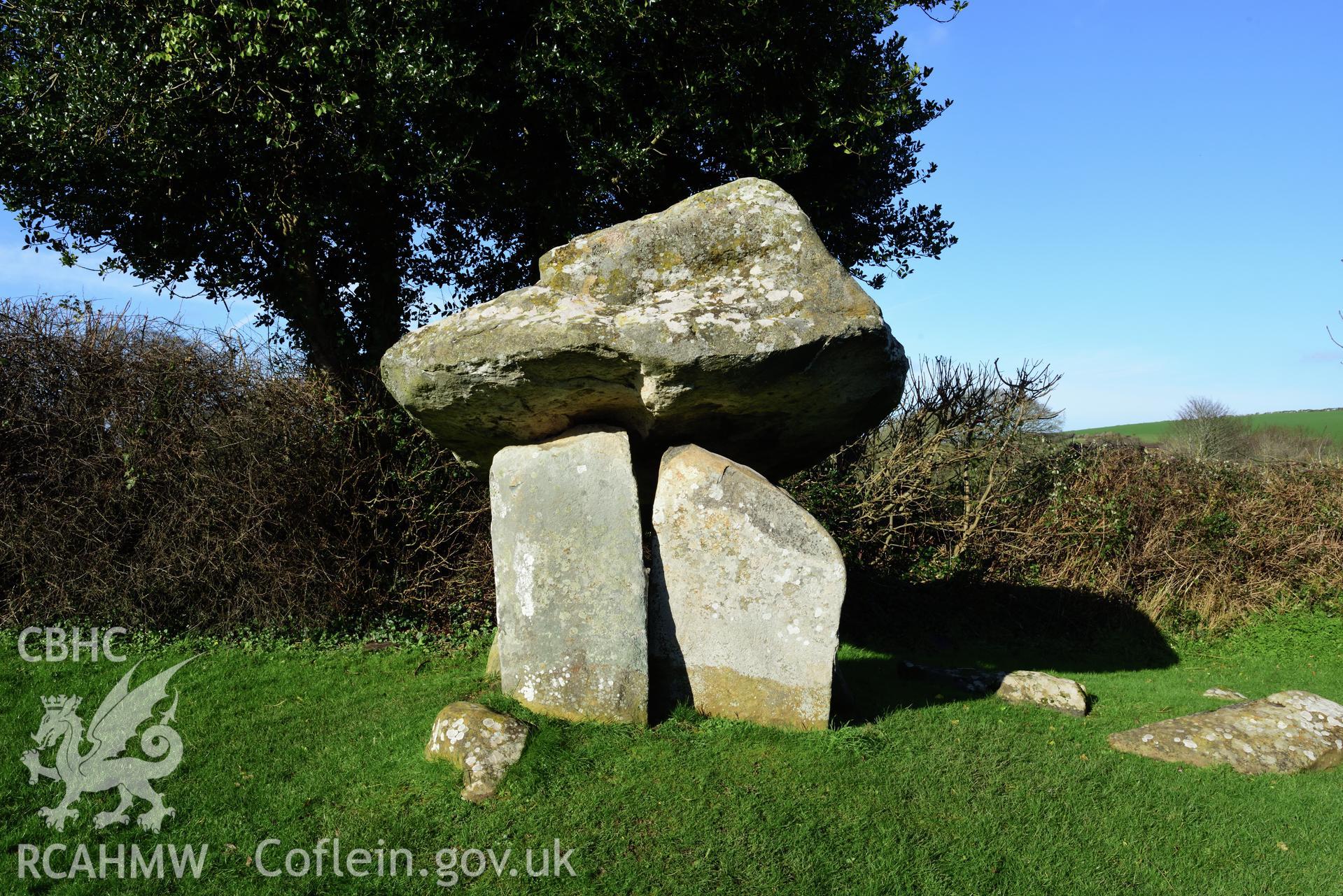 Royal Commission photo survey of Carreg Coetan chambered tomb in winter light, by Toby Driver