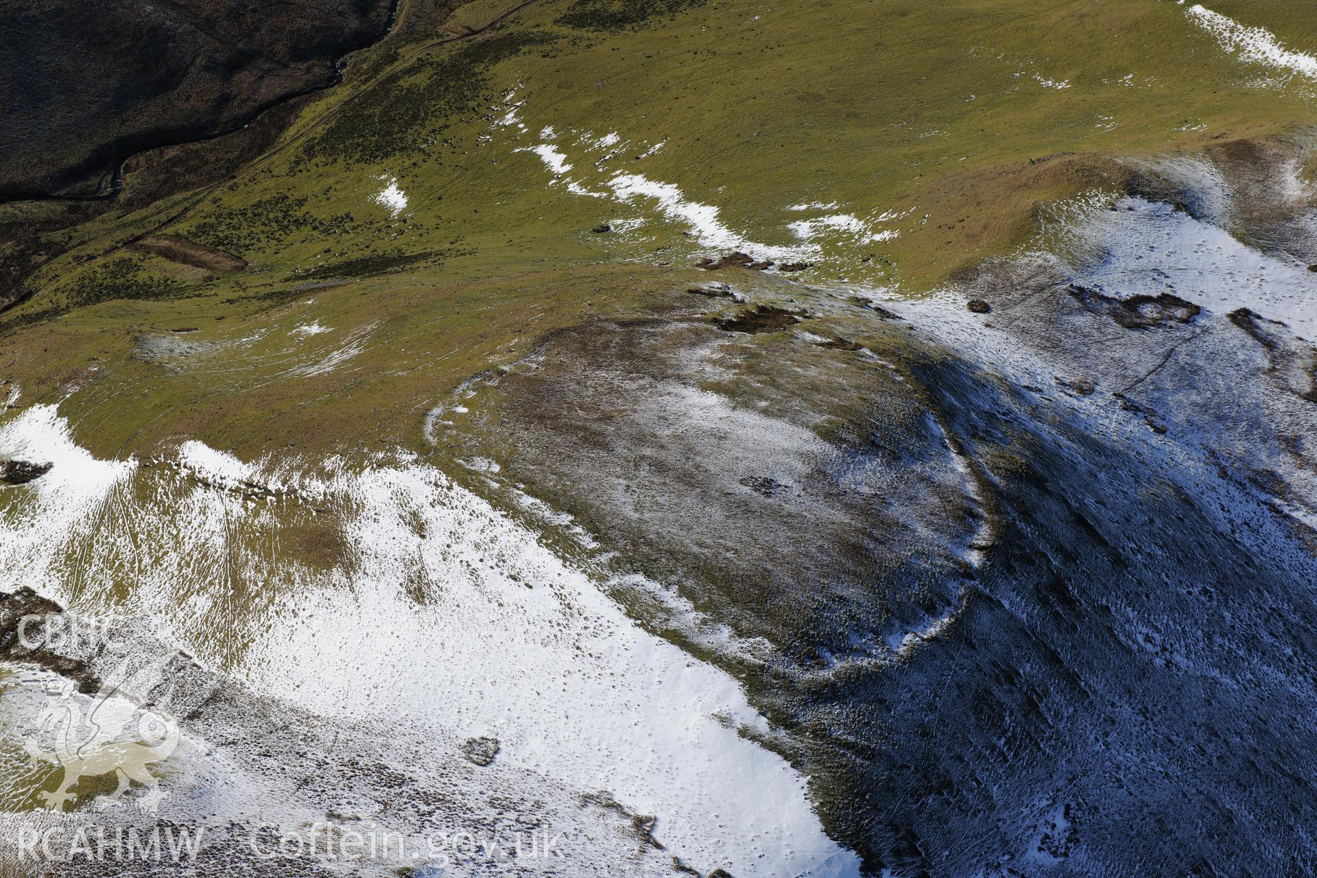 Castell Rhyfel hillfort, east of Tregaron. Oblique aerial photograph taken during the Royal Commission's programme of archaeological aerial reconnaissance by Toby Driver on 4th February 2015.