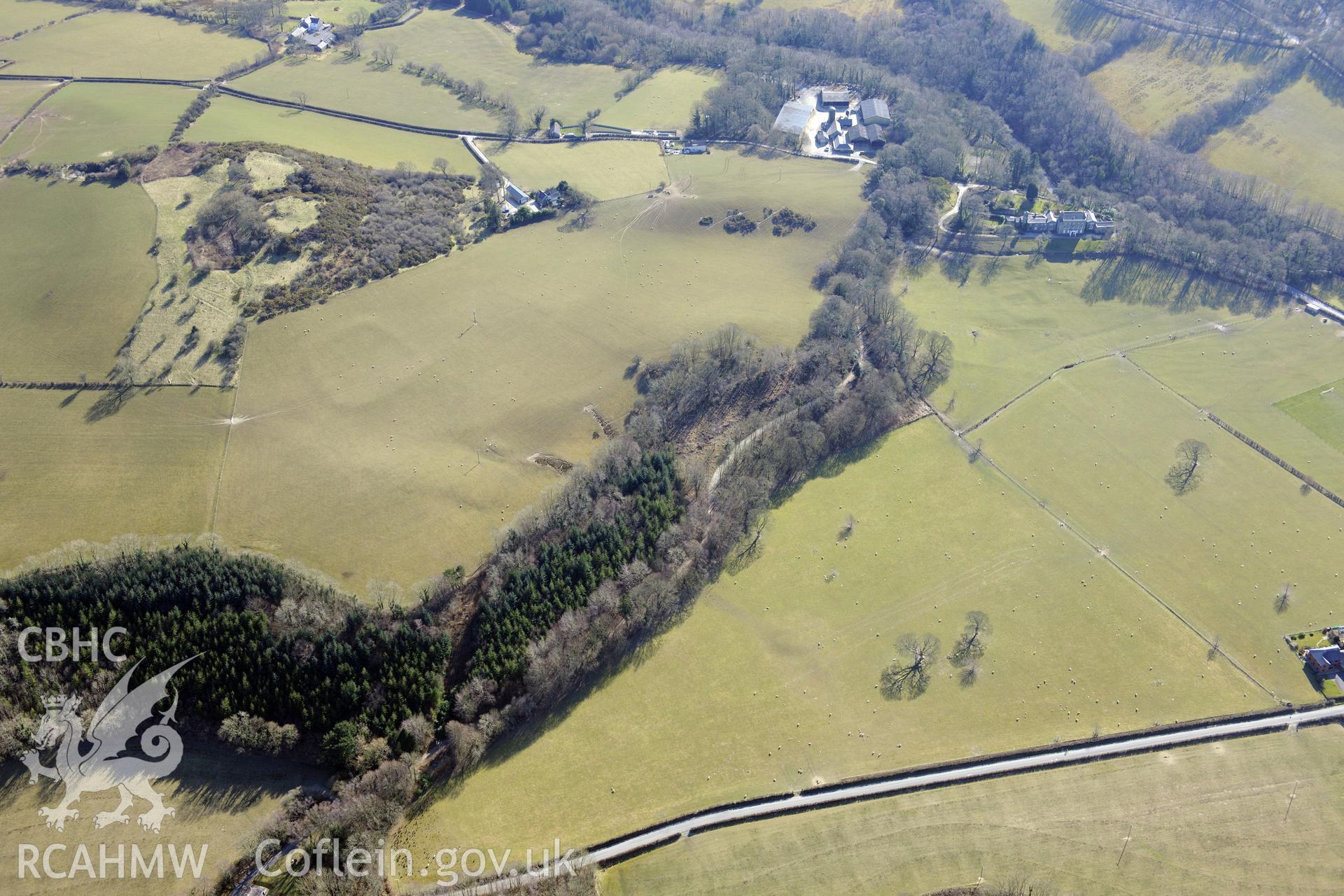 Pen-y-Castell hillfort and a defended enclosure to its north, Llanilar, south east of Aberystwyth. Oblique aerial photograph taken during the Royal Commission's programme of archaeological aerial reconnaissance by Toby Driver on 2nd April 2013.