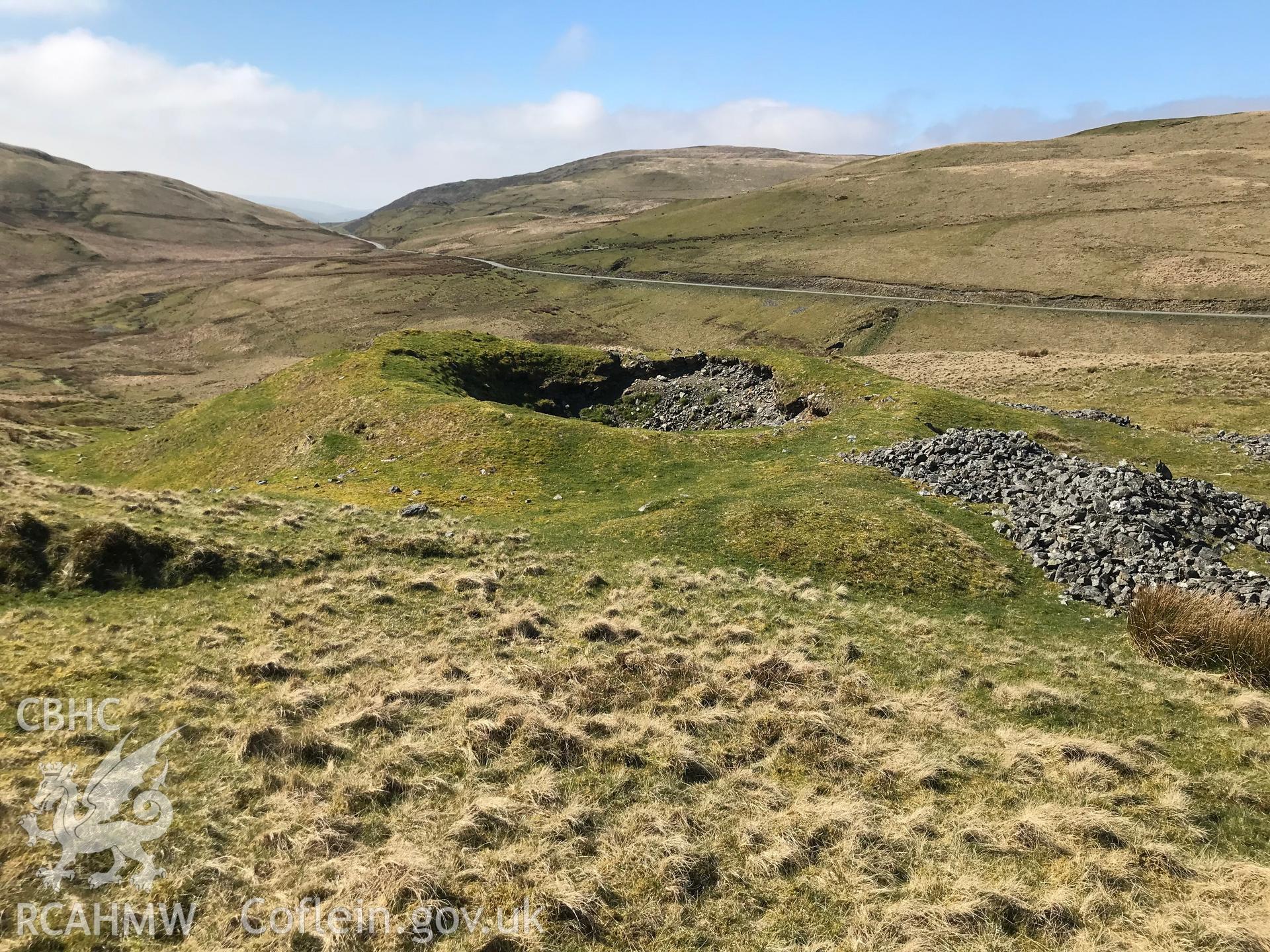 Colour photograph of earthworks at Esgairhir lead mine engine house, east of Tre Taliesin, Aberystwyth, taken by Paul R. Davis on 29th March 2019.