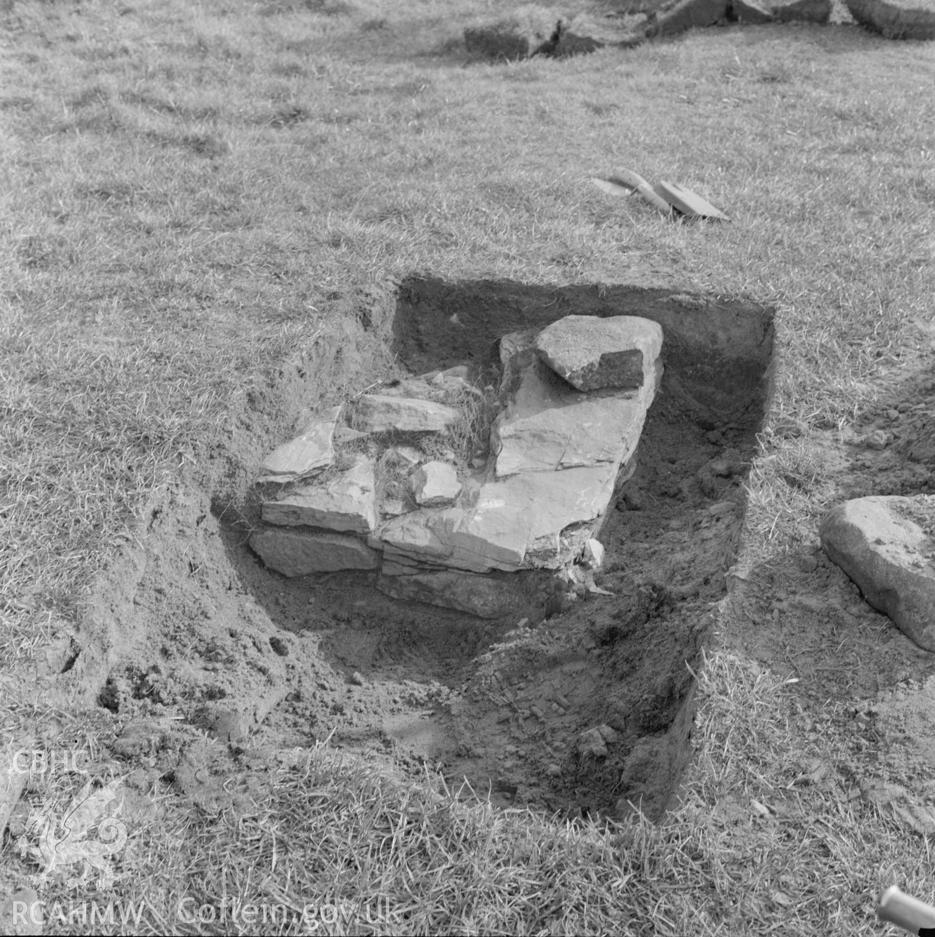 Digital copy of a black and white negative showing excavation at St. Patrick's Chapel, Whitesands Bay, Pembrokeshire taken February 1970.