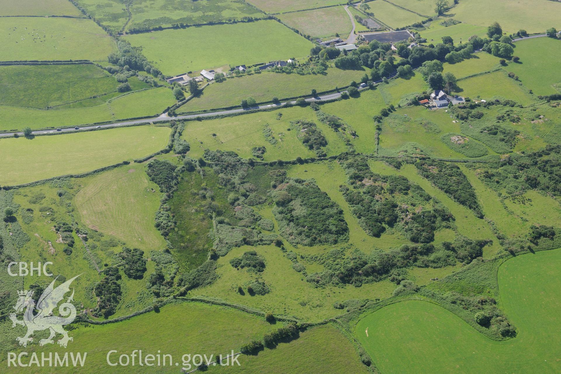 Tan-y-Graig farm, and the remains of settlements and a field system at Clogwyn Bach, near Abererch. Oblique aerial photograph taken during the Royal Commission's programme of archaeological aerial reconnaissance by Toby Driver on 23rd June 2015.