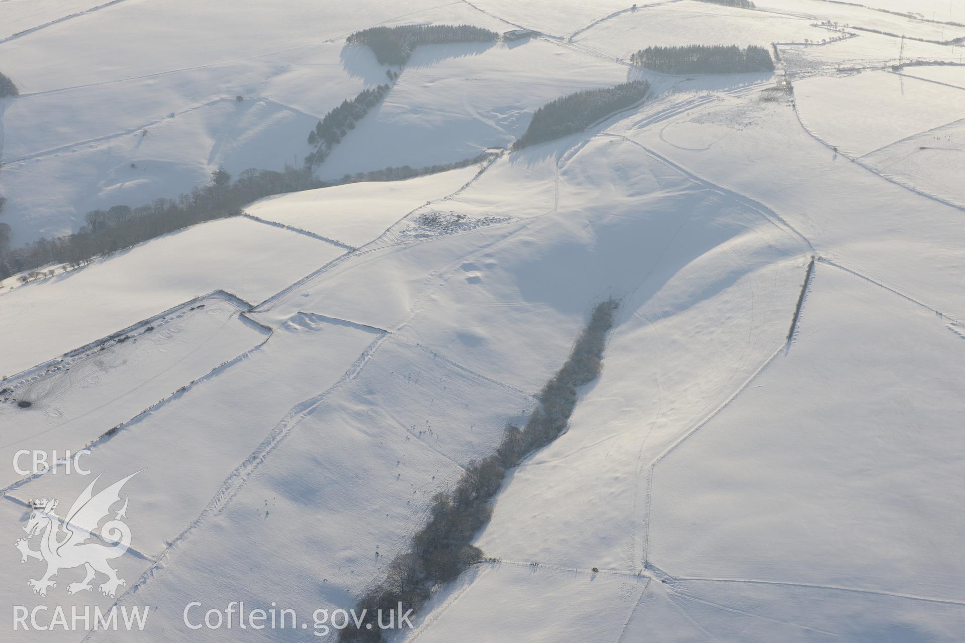 Mynydd Baedan platform, north west of Bridgend. Oblique aerial photograph taken during the Royal Commission?s programme of archaeological aerial reconnaissance by Toby Driver on 24th January 2013.