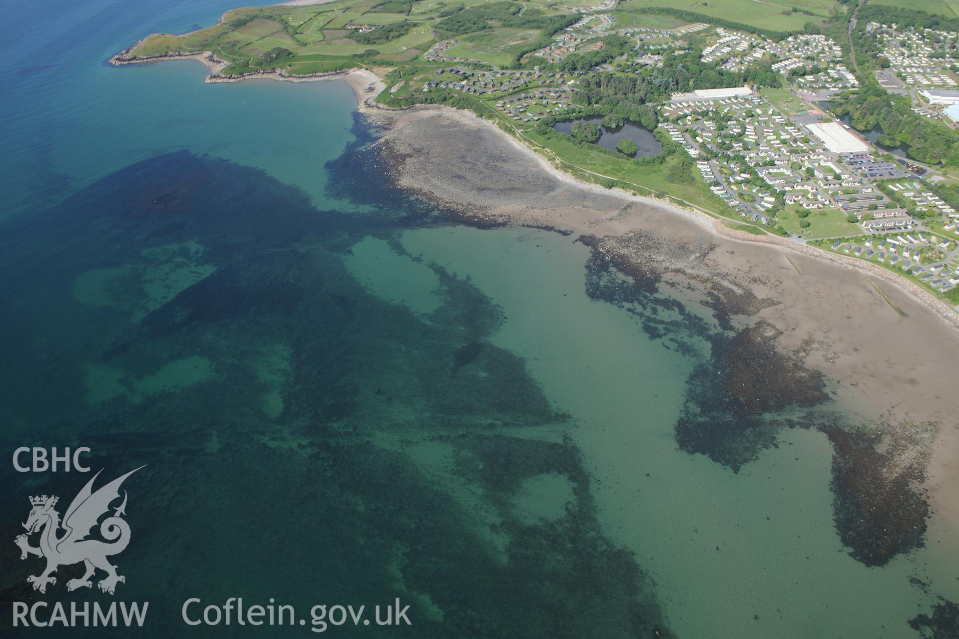 Hafan y Mor Holiday Park and Cerrig y Barcdy fish trap, Pwllheli. Oblique aerial photograph taken during the Royal Commission's programme of archaeological aerial reconnaissance by Toby Driver on 23rd June 2015.