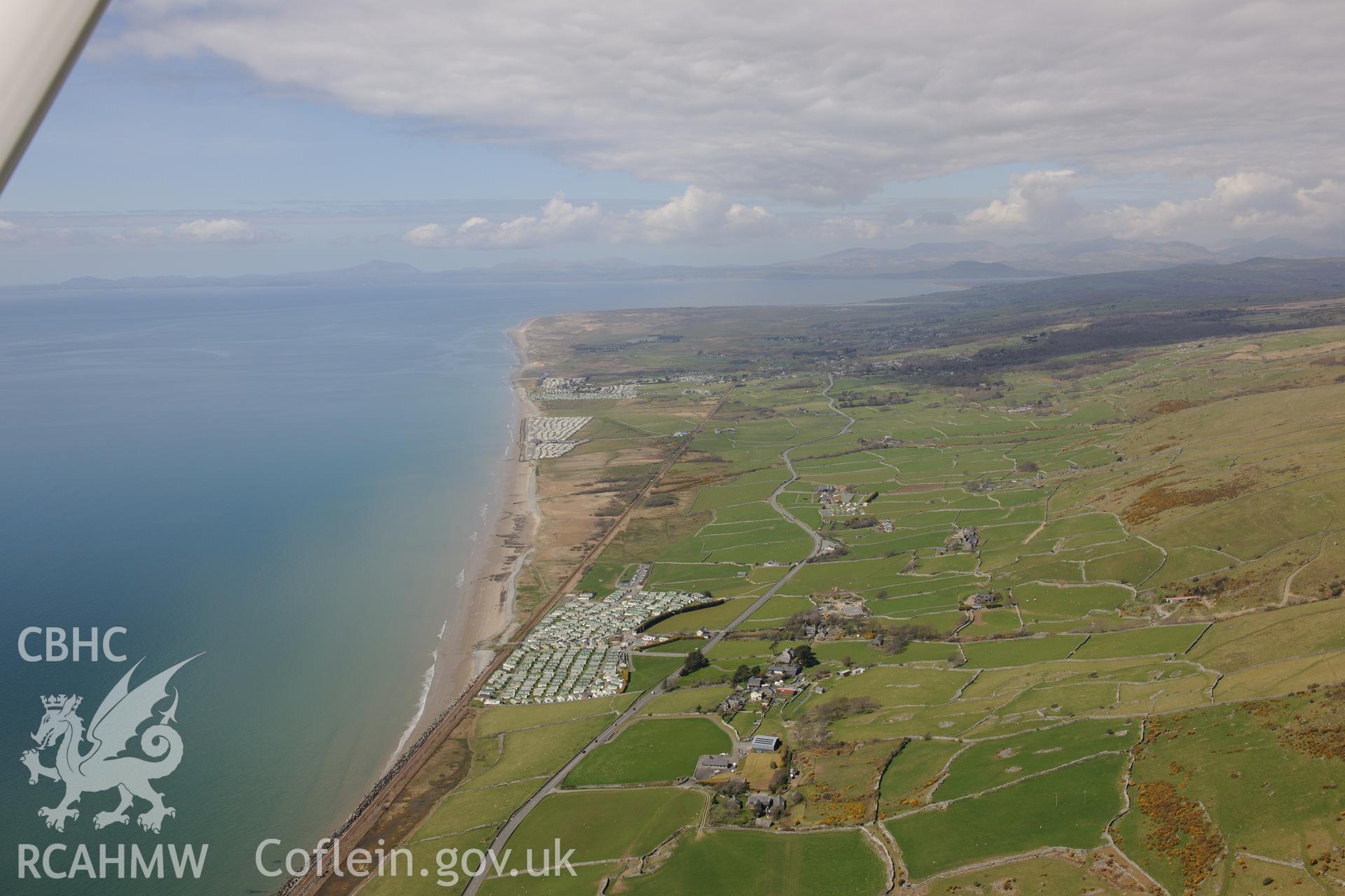 Peat deposits on the Llanaber coastline and Llanbedr airfield. Oblique aerial photograph taken during the Royal Commission?s programme of archaeological aerial reconnaissance by Toby Driver on 1st May 2013.