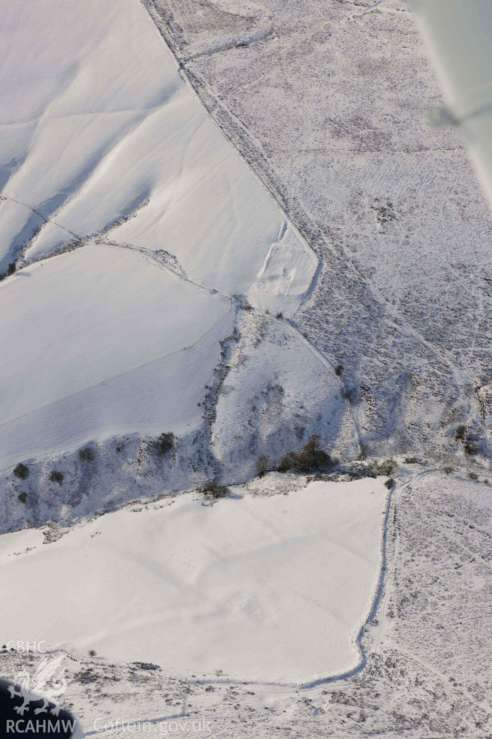 Cwm-Twrch Medieval platform settlement, Glascwm. Oblique aerial photograph taken during the Royal Commission?s programme of archaeological aerial reconnaissance by Toby Driver on 15th January 2013.