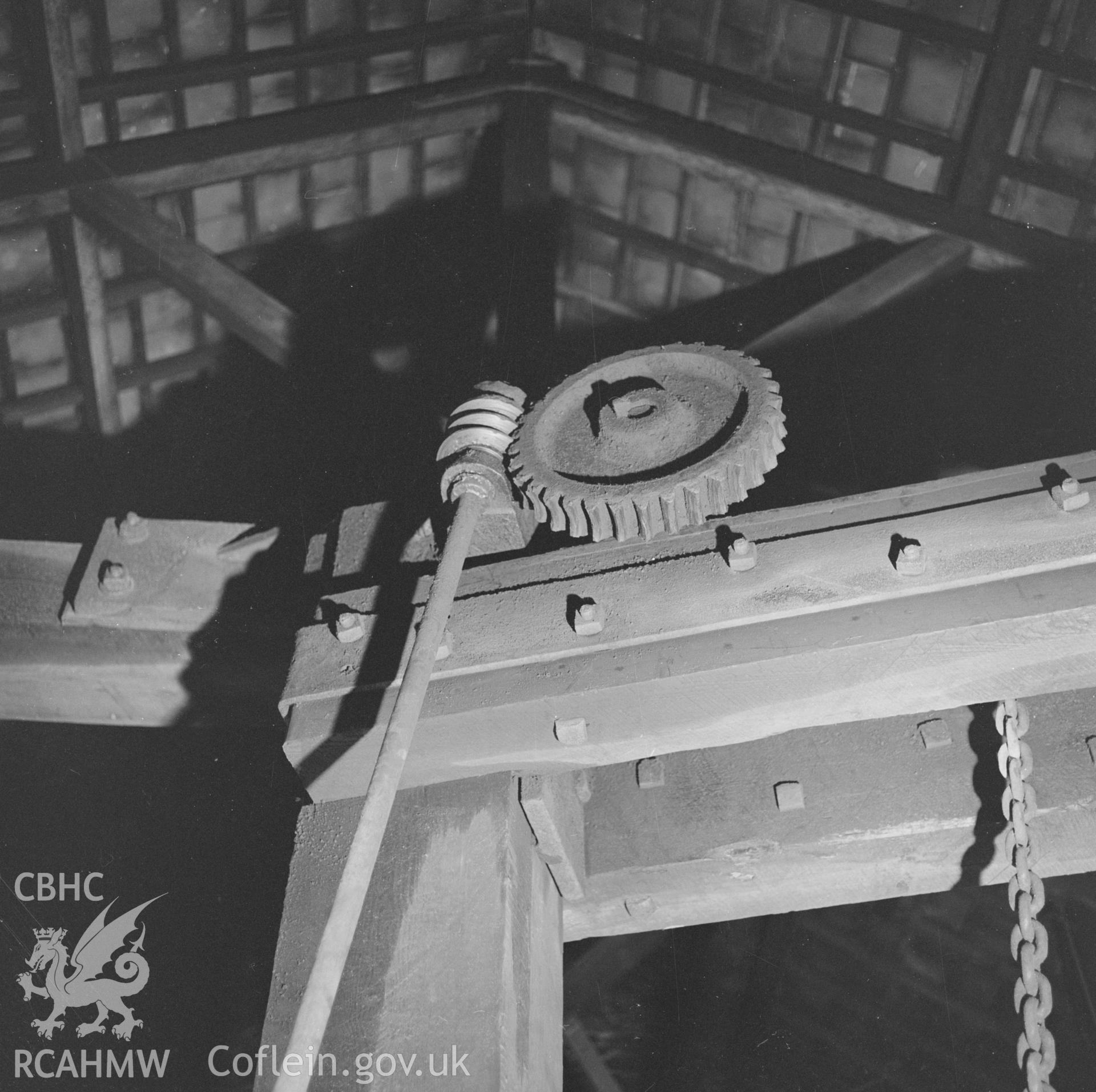 Digital copy of a black and white negative showing detail of the crane at Player's Works Foundry, Clydach, taken by RCAHMW, undated