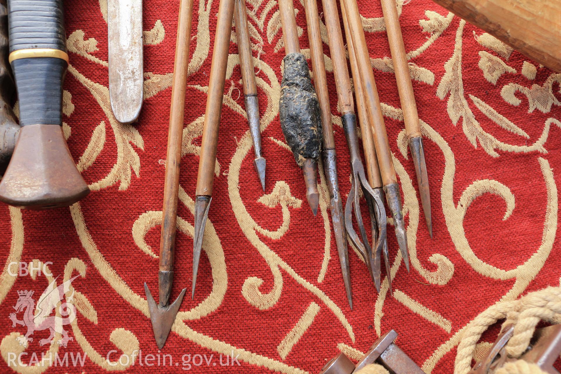 Investigators Photographs at Chepstow Castle. Display of various types of medieval arrowheads; reproduction.