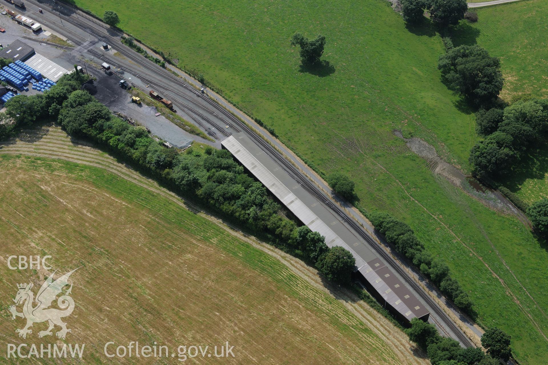 Dinas Junction railway station, Welsh Highland Railway. Oblique aerial photograph taken during the Royal Commission?s programme of archaeological aerial reconnaissance by Toby Driver on 12th July 2013.